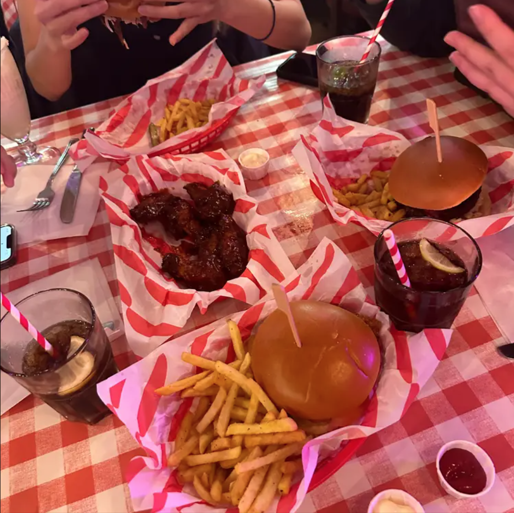Karen's Diner in London with checkered tablecloth, ideal for team-building events and gatherings.