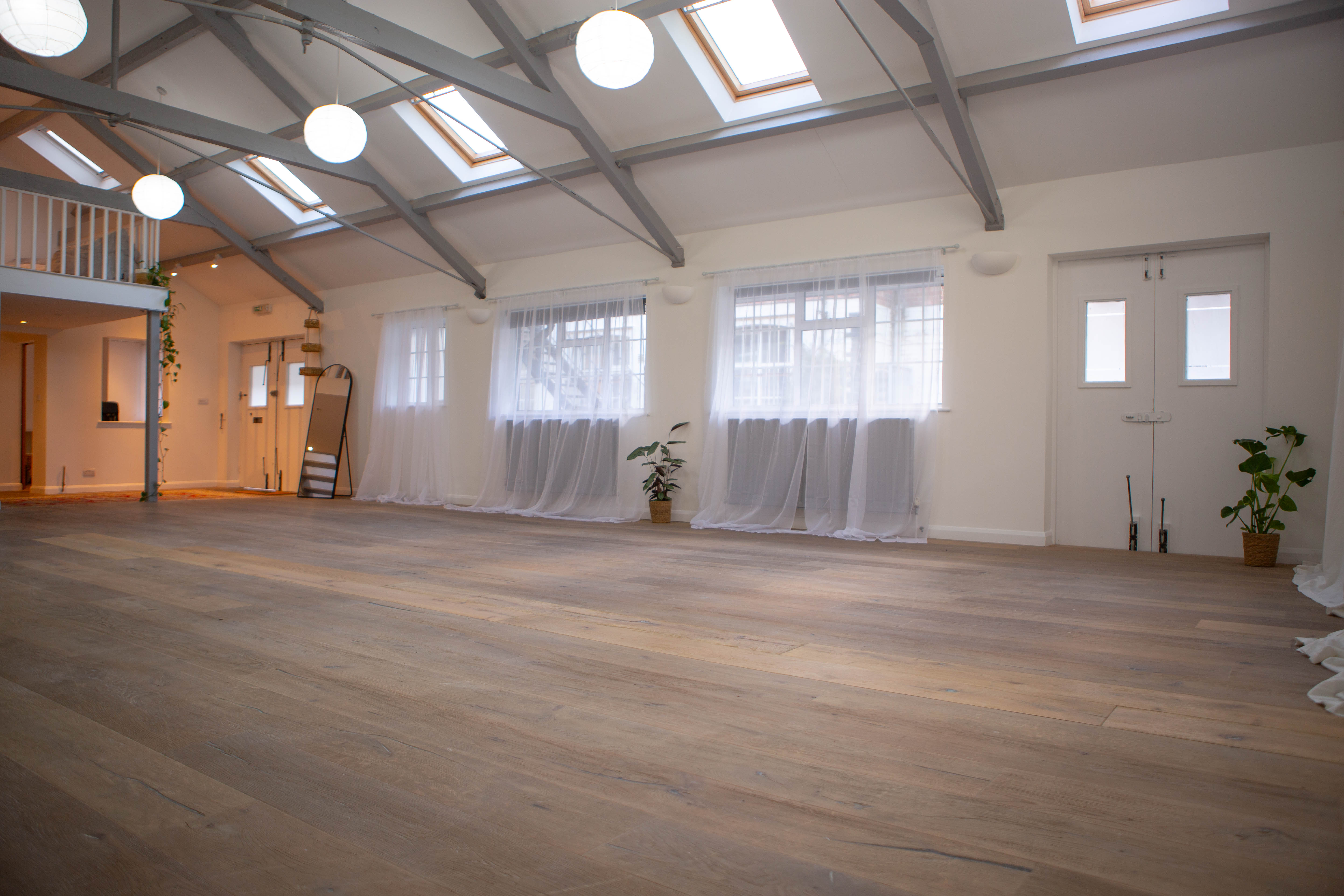 Versatile event space in The Space London with natural light, ideal for workshops and gatherings.