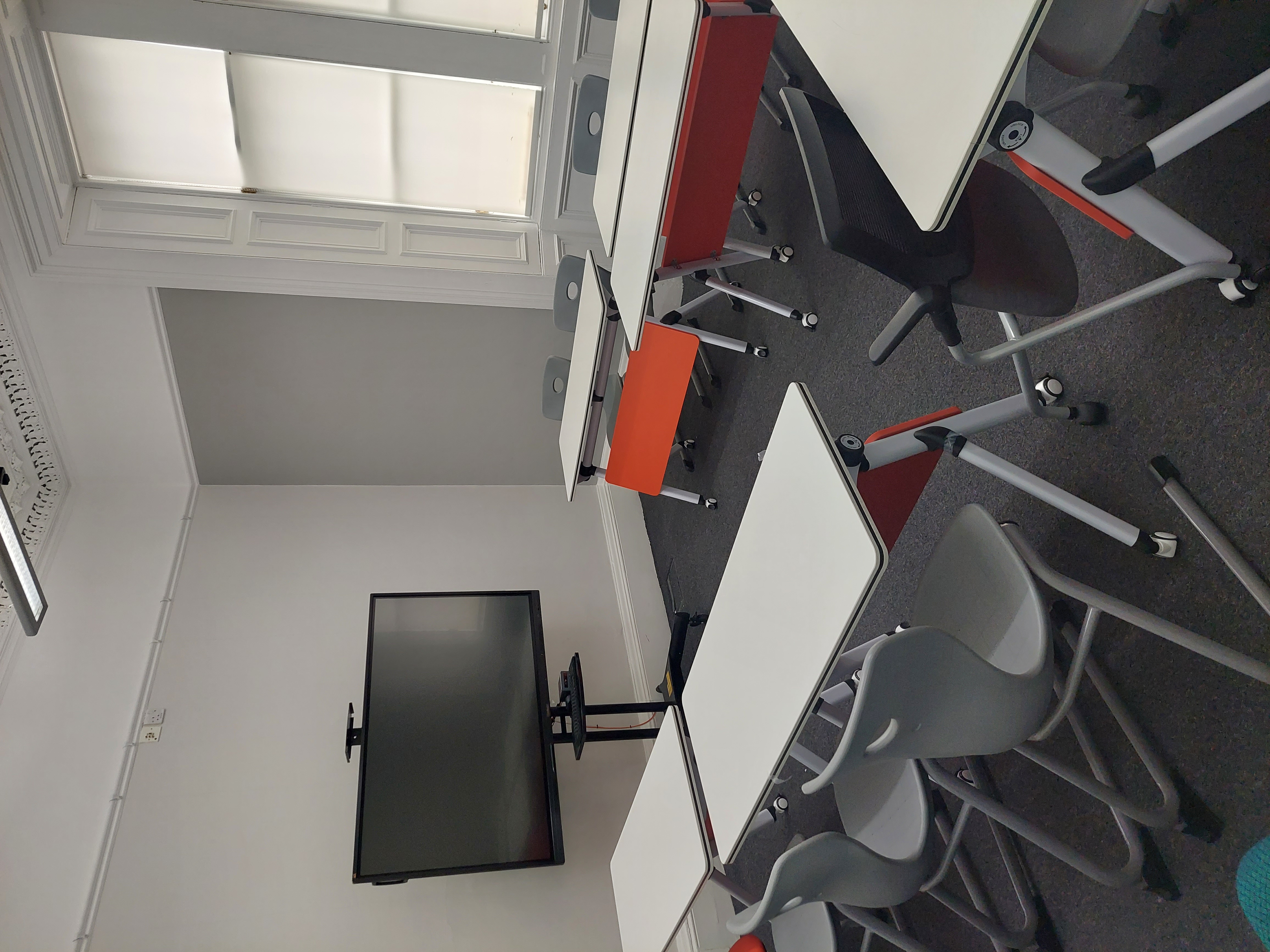 Modern meeting room in West End Rooms, Edinburgh, ideal for workshops and training sessions.