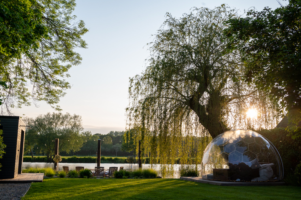 Country house venue with glass dome, perfect for corporate retreats and social gatherings.