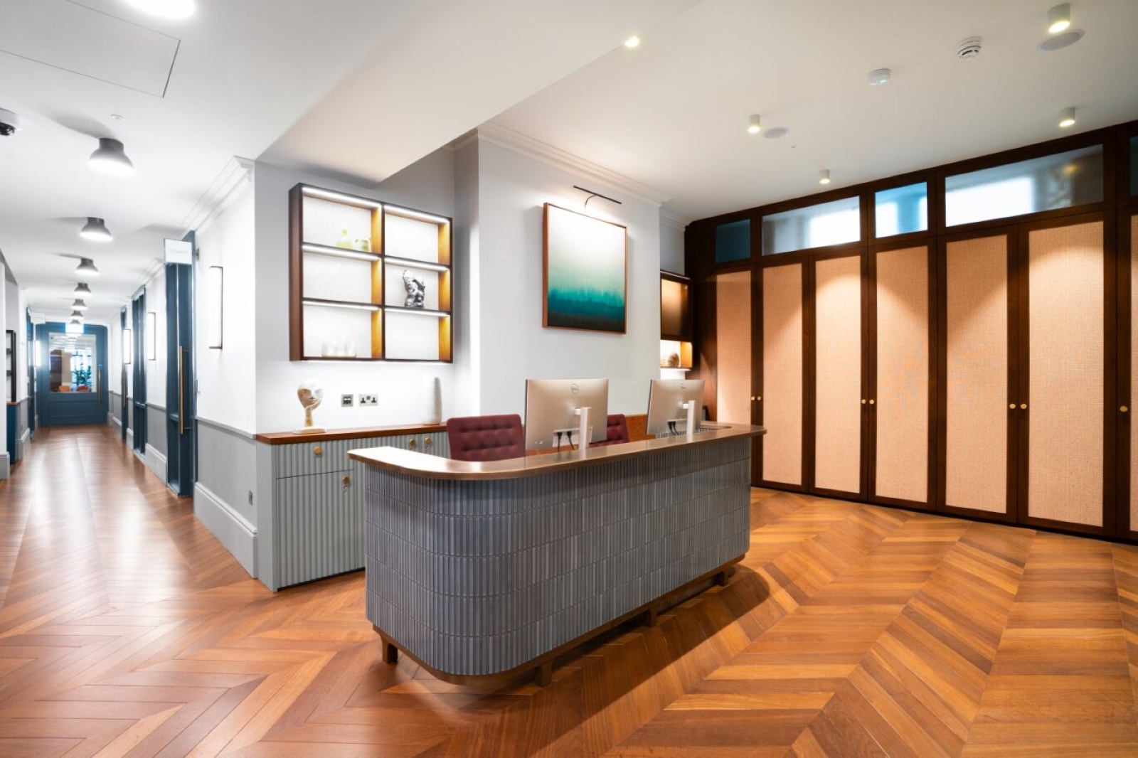 Modern reception area at Salisbury House for events, featuring warm wood flooring.