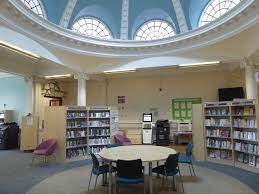 West Greenwich Library with circular table, ideal for workshops and community events.