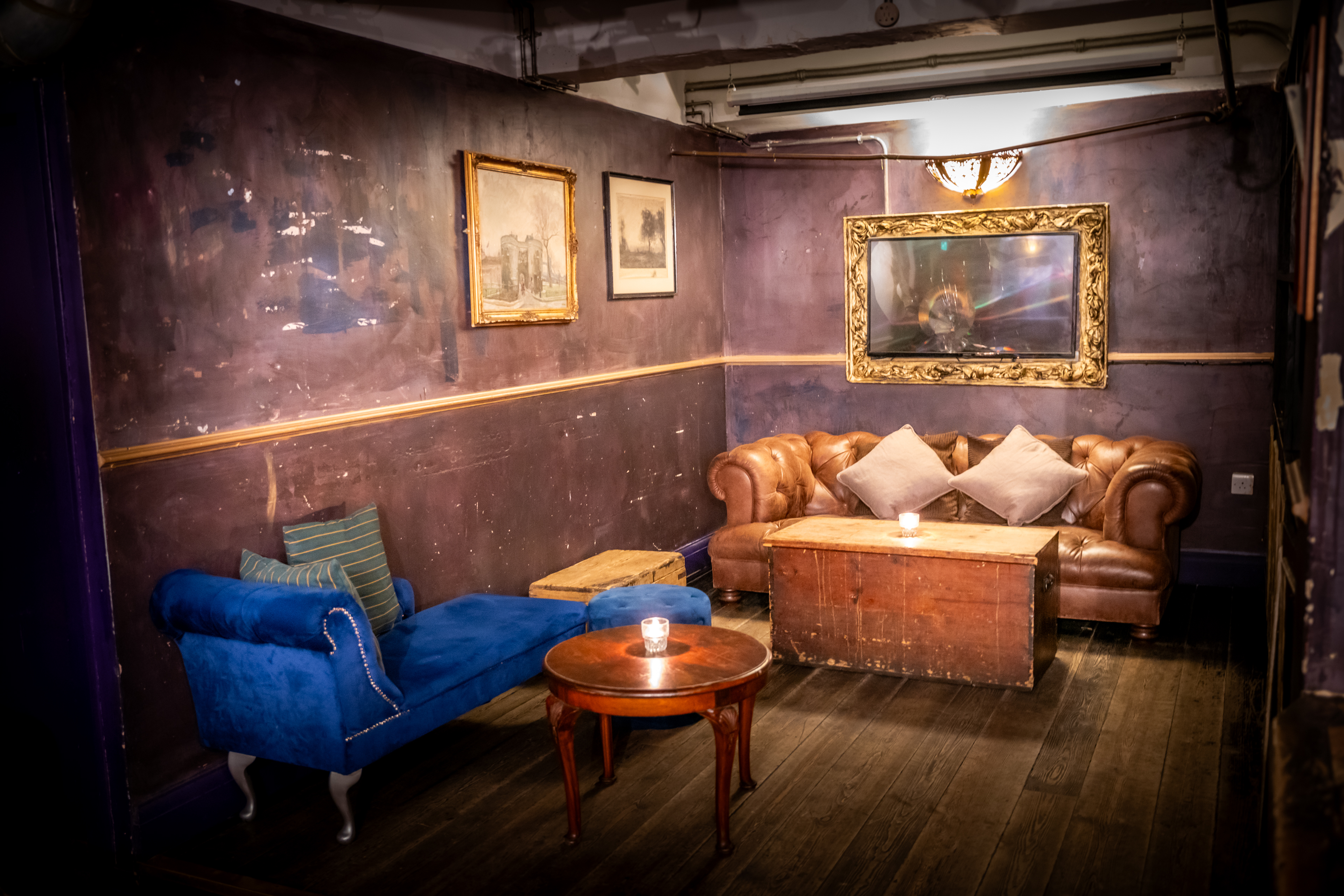 Cozy lounge at The Lucky Pig for private hire, ideal for meetings and networking events.