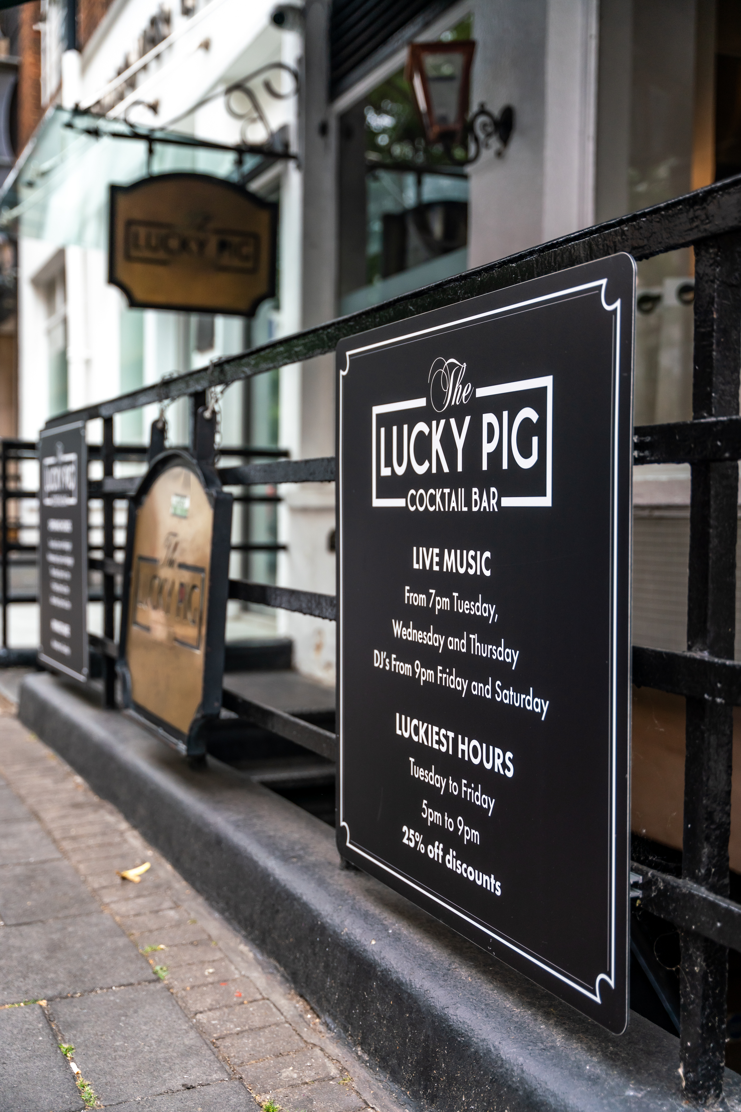 Stylish entrance of The Lucky Pig Cocktail Bar for private hire events and live music.