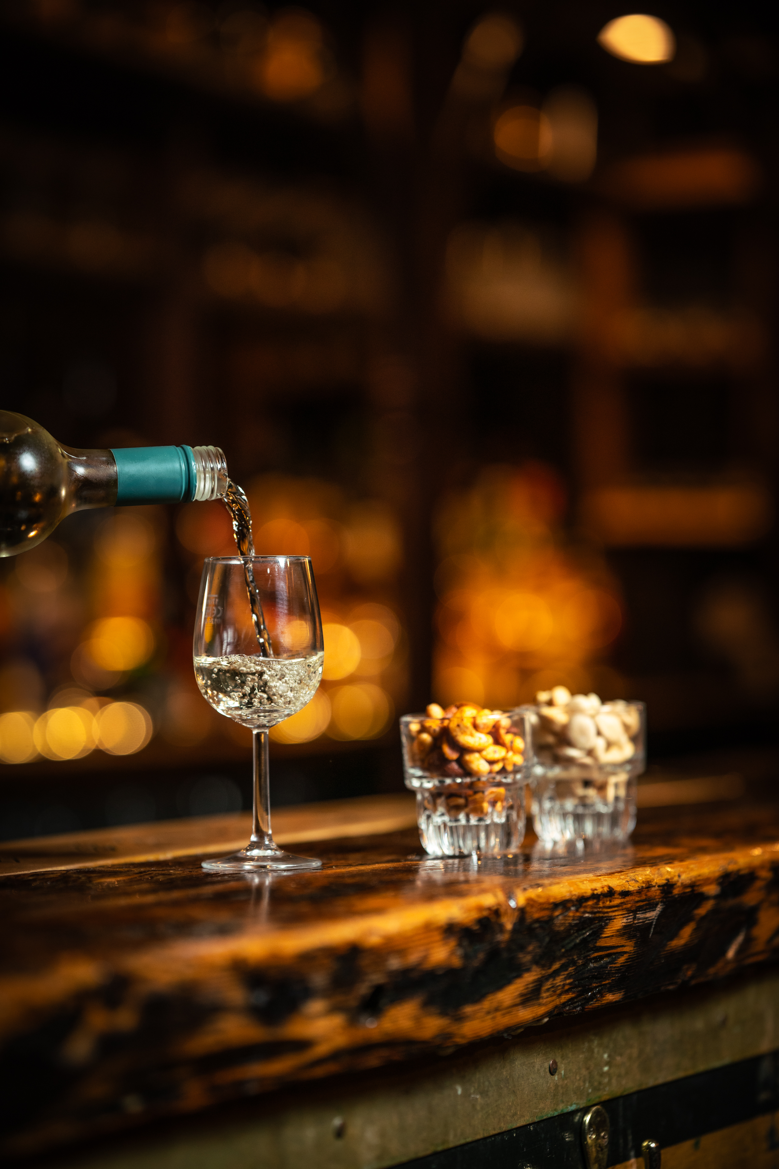 Whole Venue Private Hire at The Lucky Pig with elegant wine service for networking events.