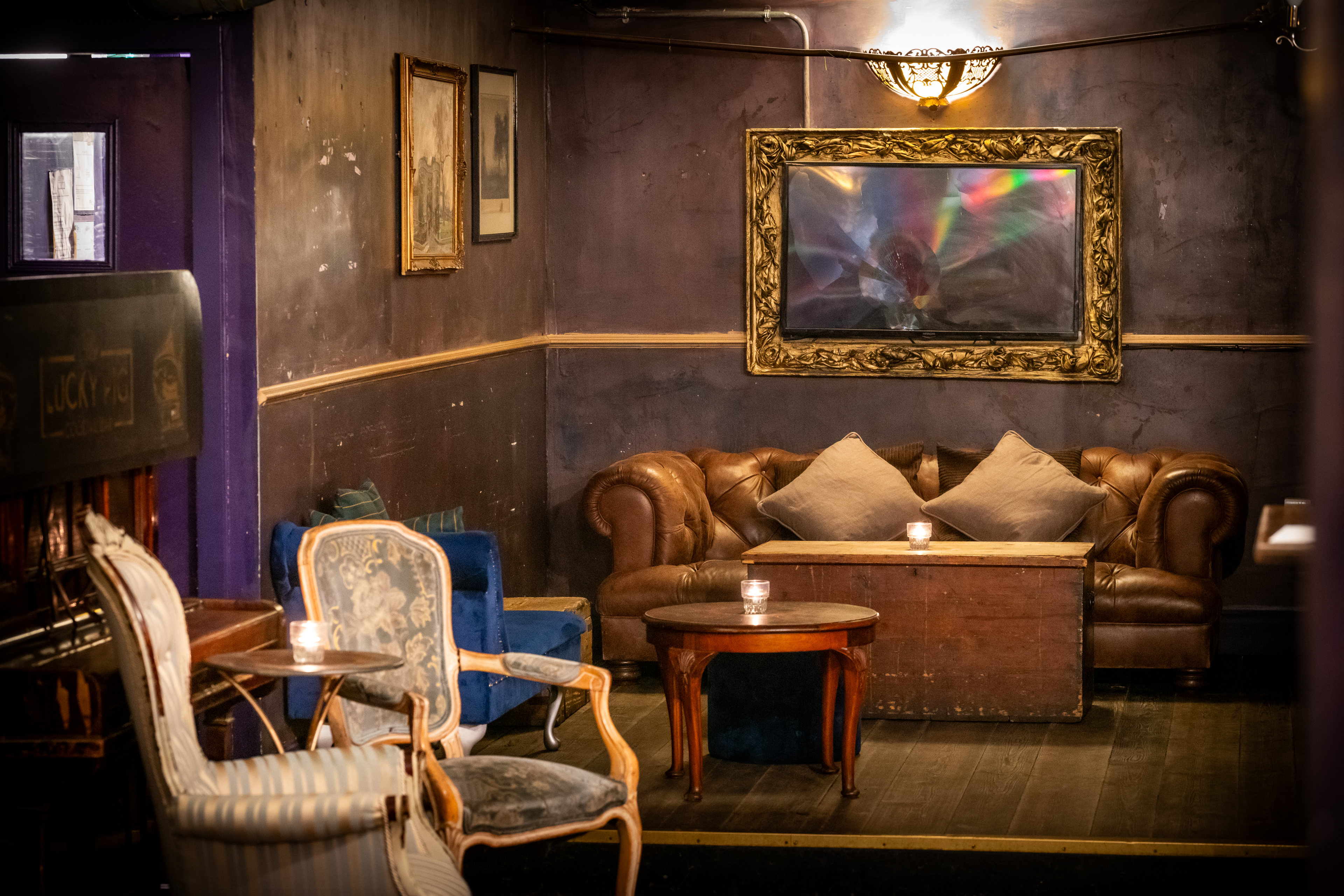 Cozy lounge at The Lucky Pig for private hire, ideal for meetings and networking events.