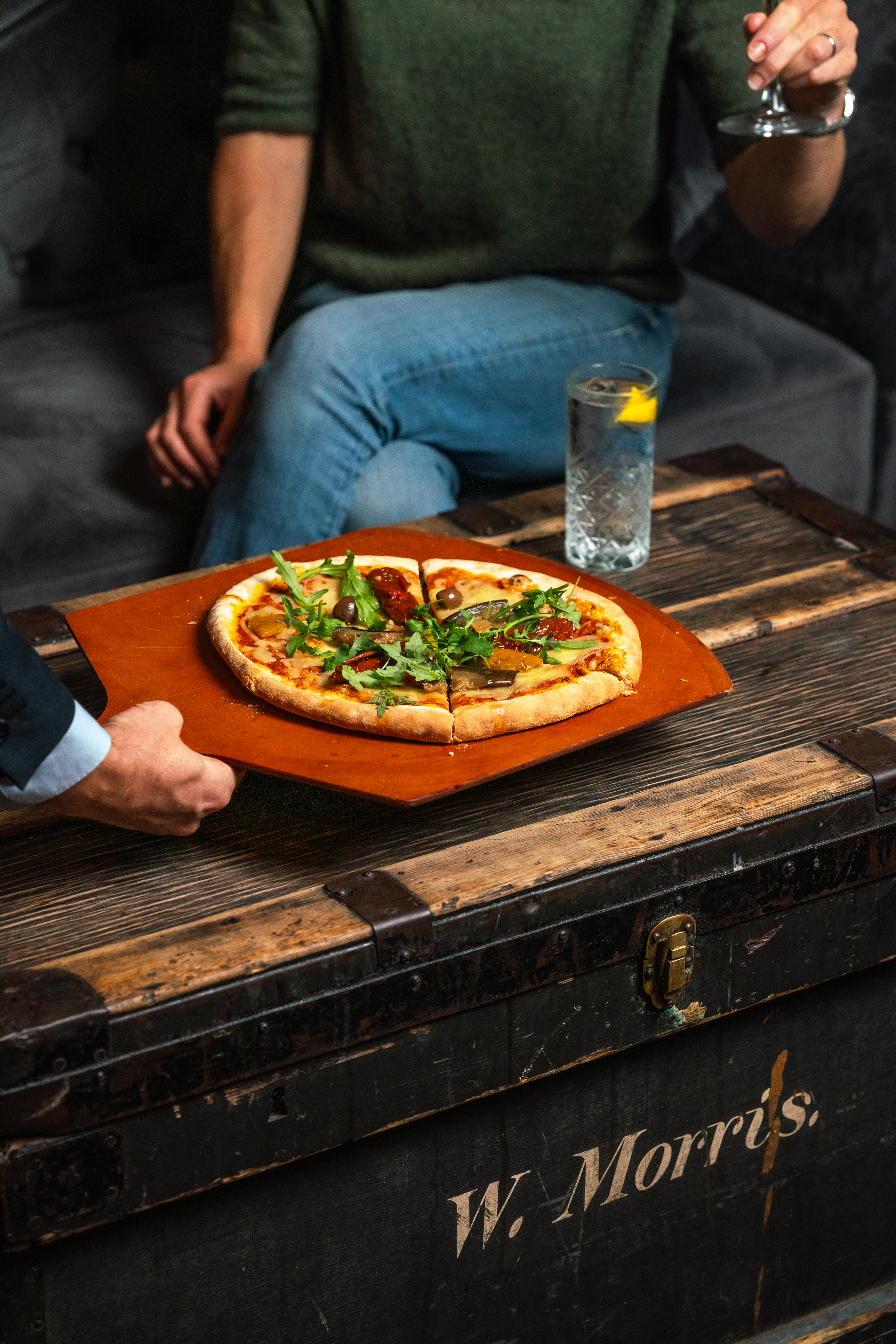 Whole Venue Private Hire at The Lucky Pig with pizza, perfect for casual networking events.
