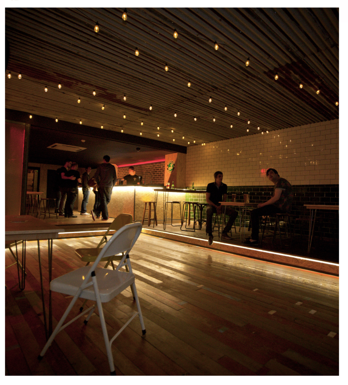 Stylish first floor venue with warm lighting for networking events and gatherings.