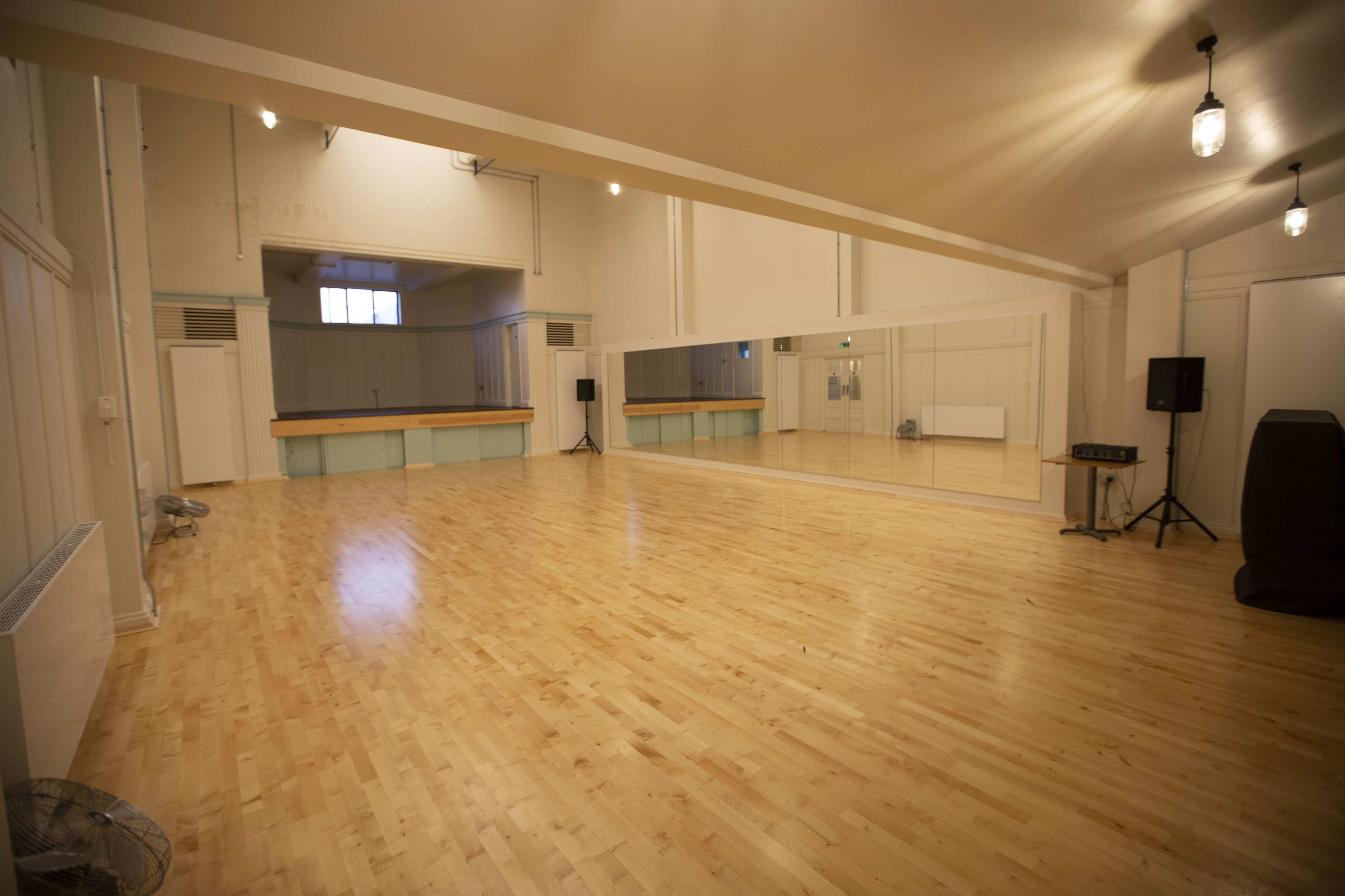 Spacious Studio 1 at International College of Musical Theatre, perfect for workshops and fitness classes.