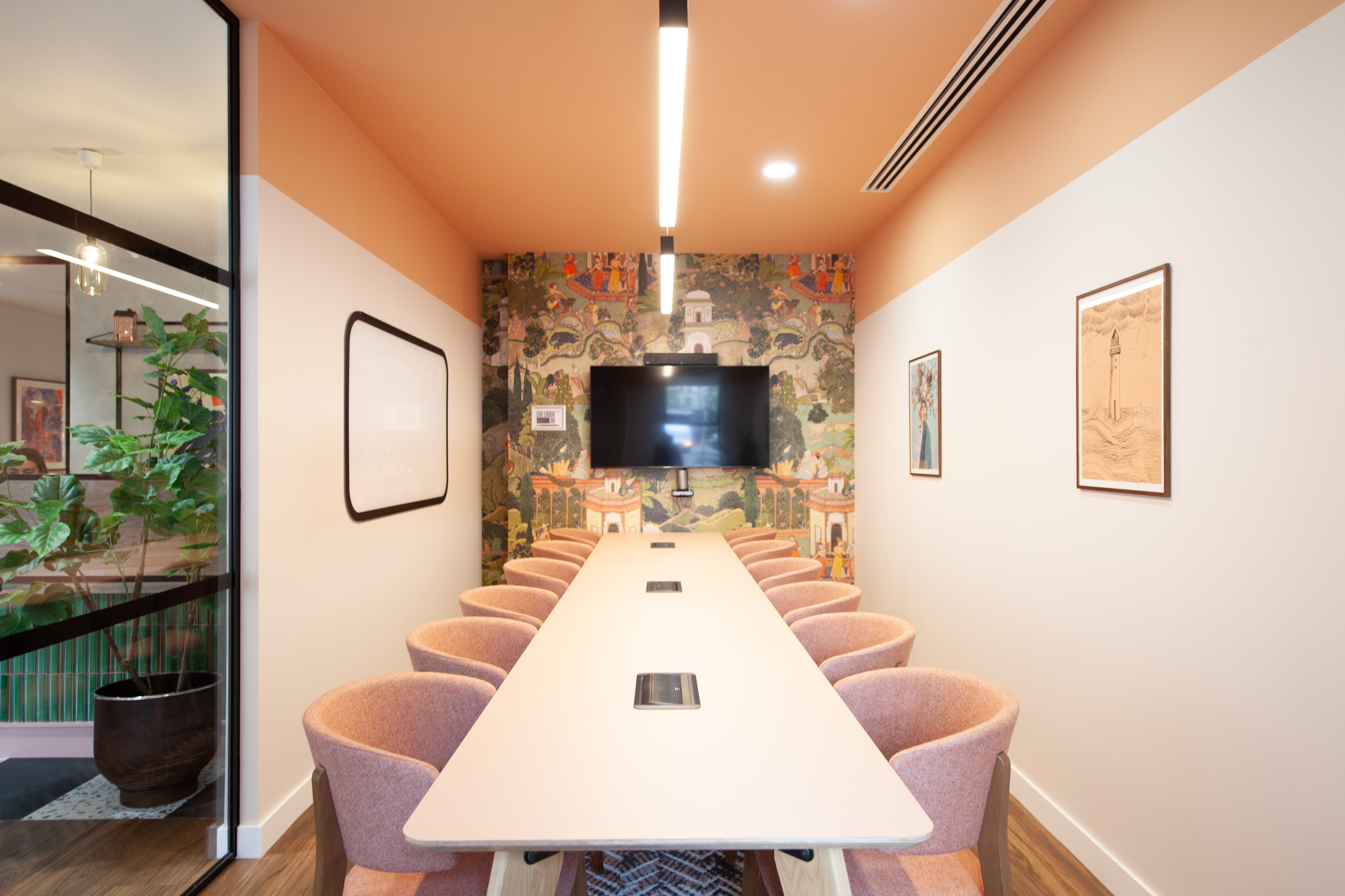Modern meeting room at Runway East Bloomsbury, ideal for presentations and brainstorming.