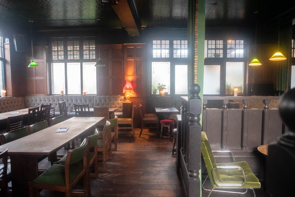 Cozy semi-private area at The Adam & Eve, perfect for intimate gatherings and networking events.