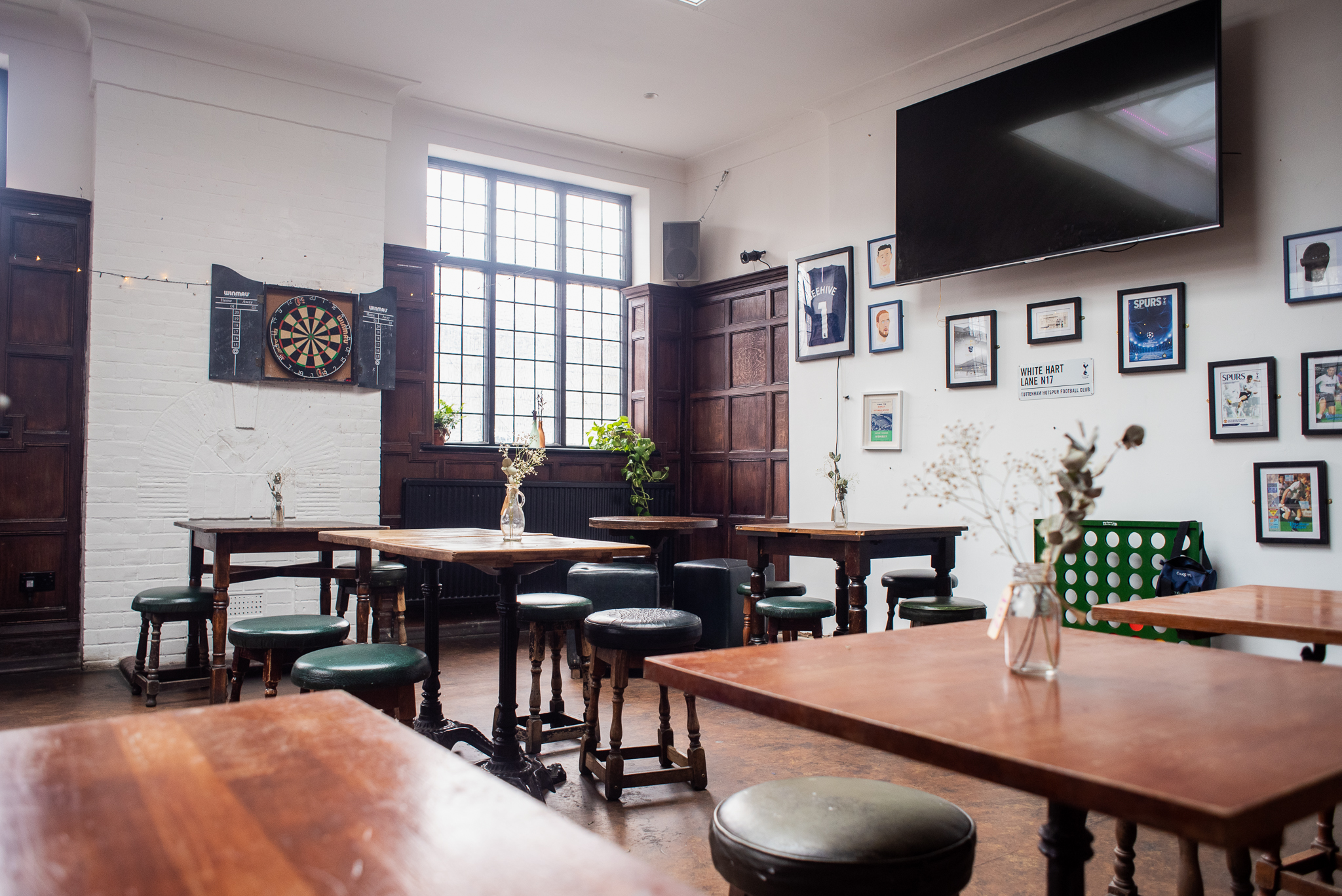 Games Room in Beehive with wooden tables, ideal for networking and workshops.