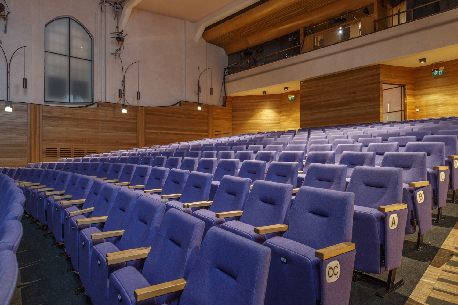 Marylebone Theatre auditorium with purple seating, ideal for conferences and presentations.