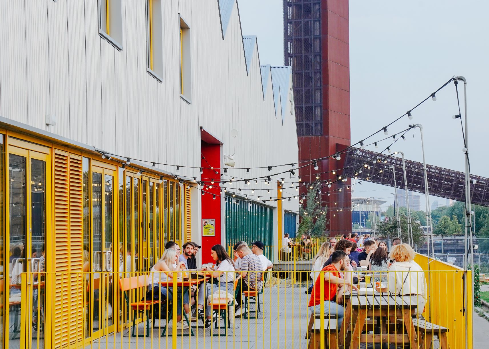Vibrant outdoor venue at Hackney Bridge for casual meetings and networking events.