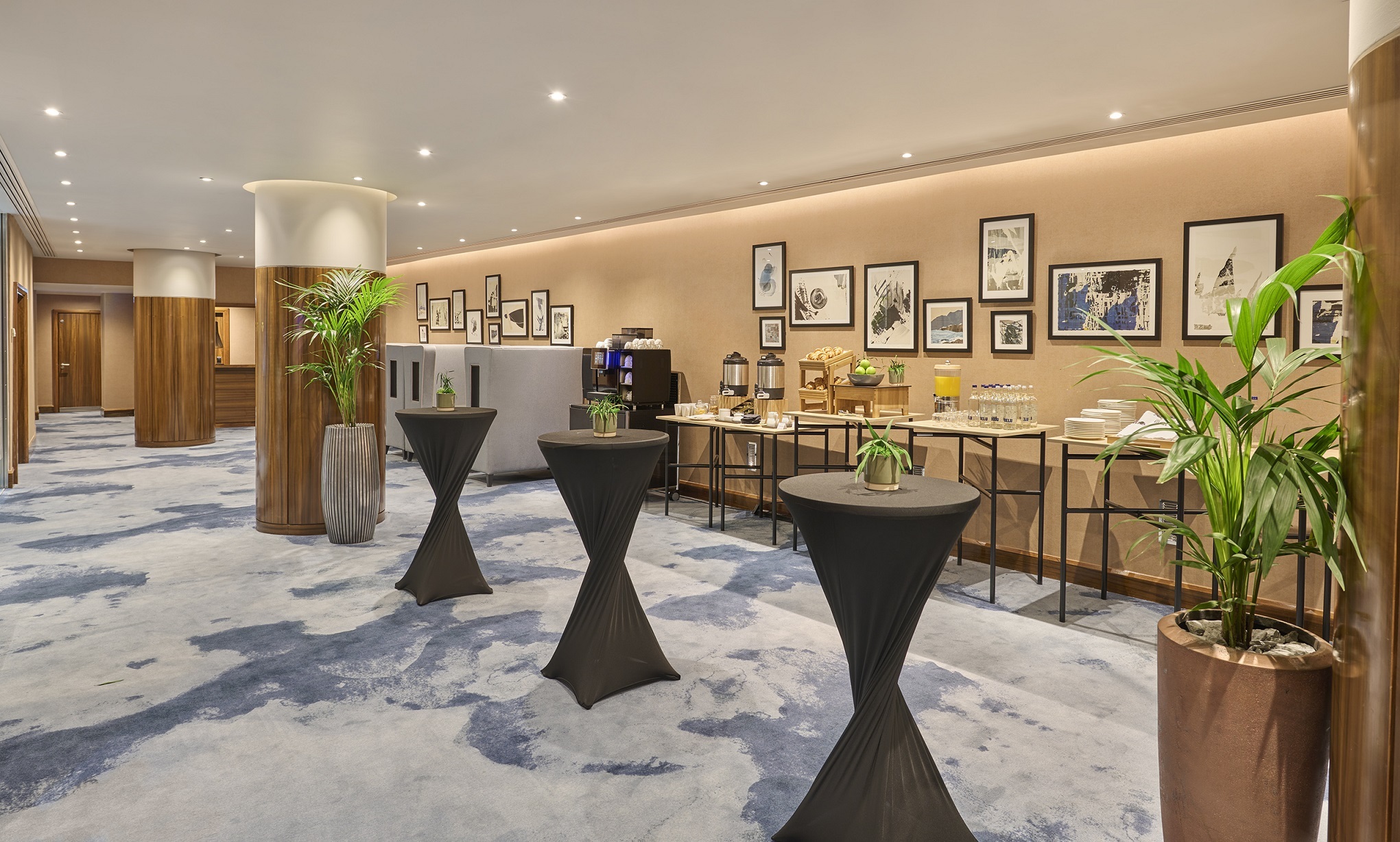 The Bridewell Suite at Hyatt Regency London, modern event space with high-top tables.