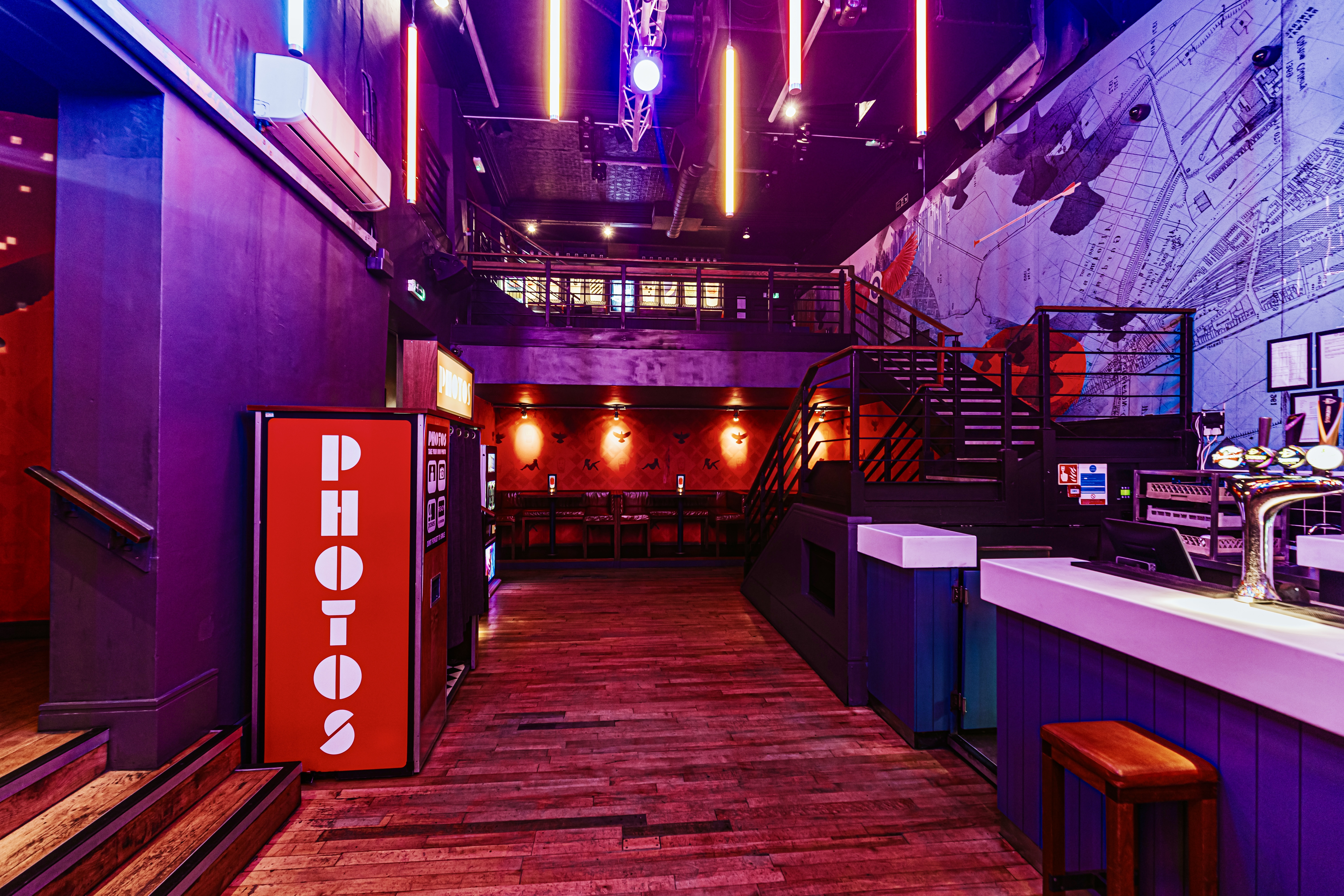 Vibrant event space at Baa Bar Nottingham with modern bar and dynamic lighting.