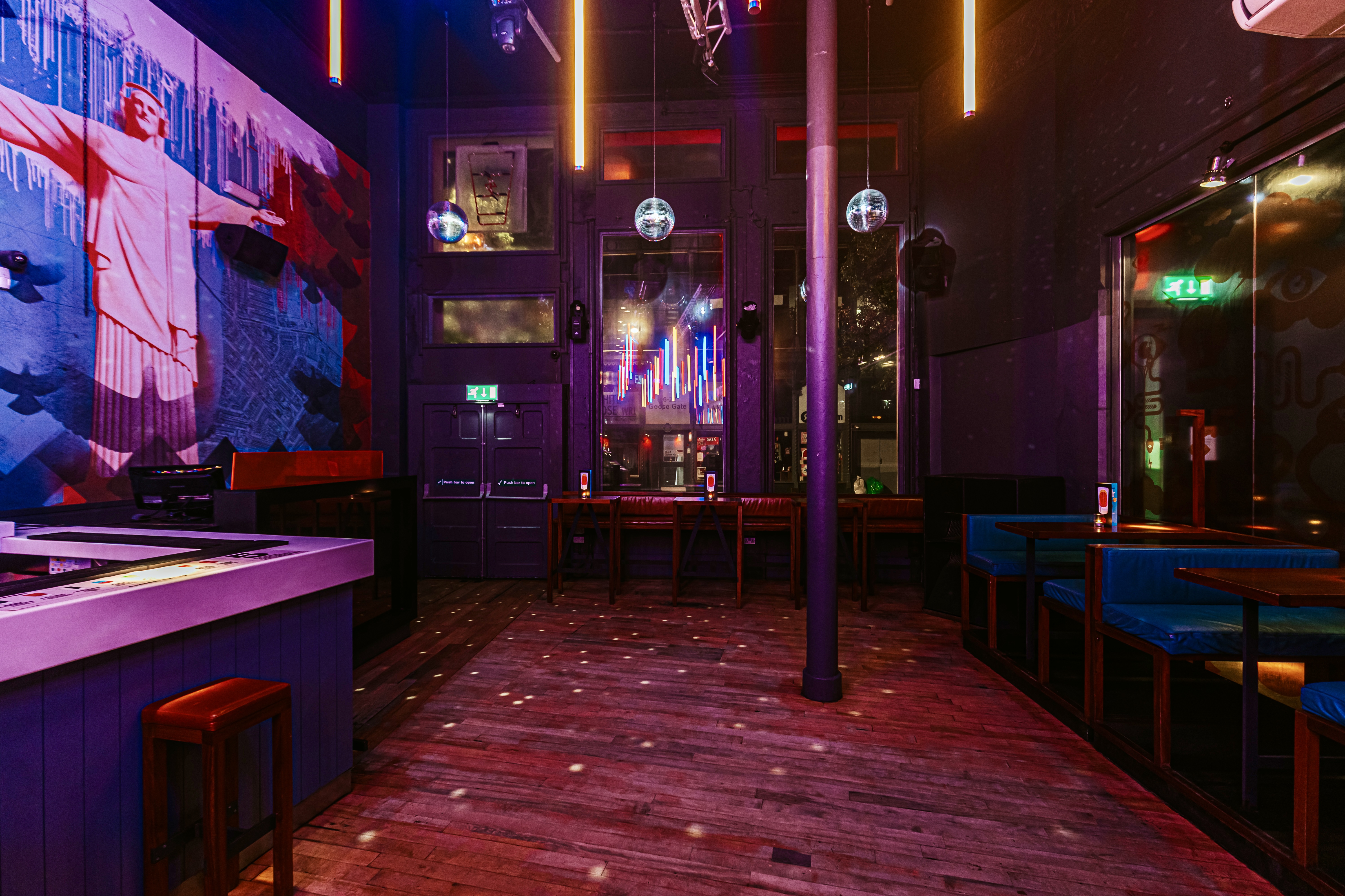 Vibrant event space in Baa Bar Nottingham with colorful lighting for parties and workshops.