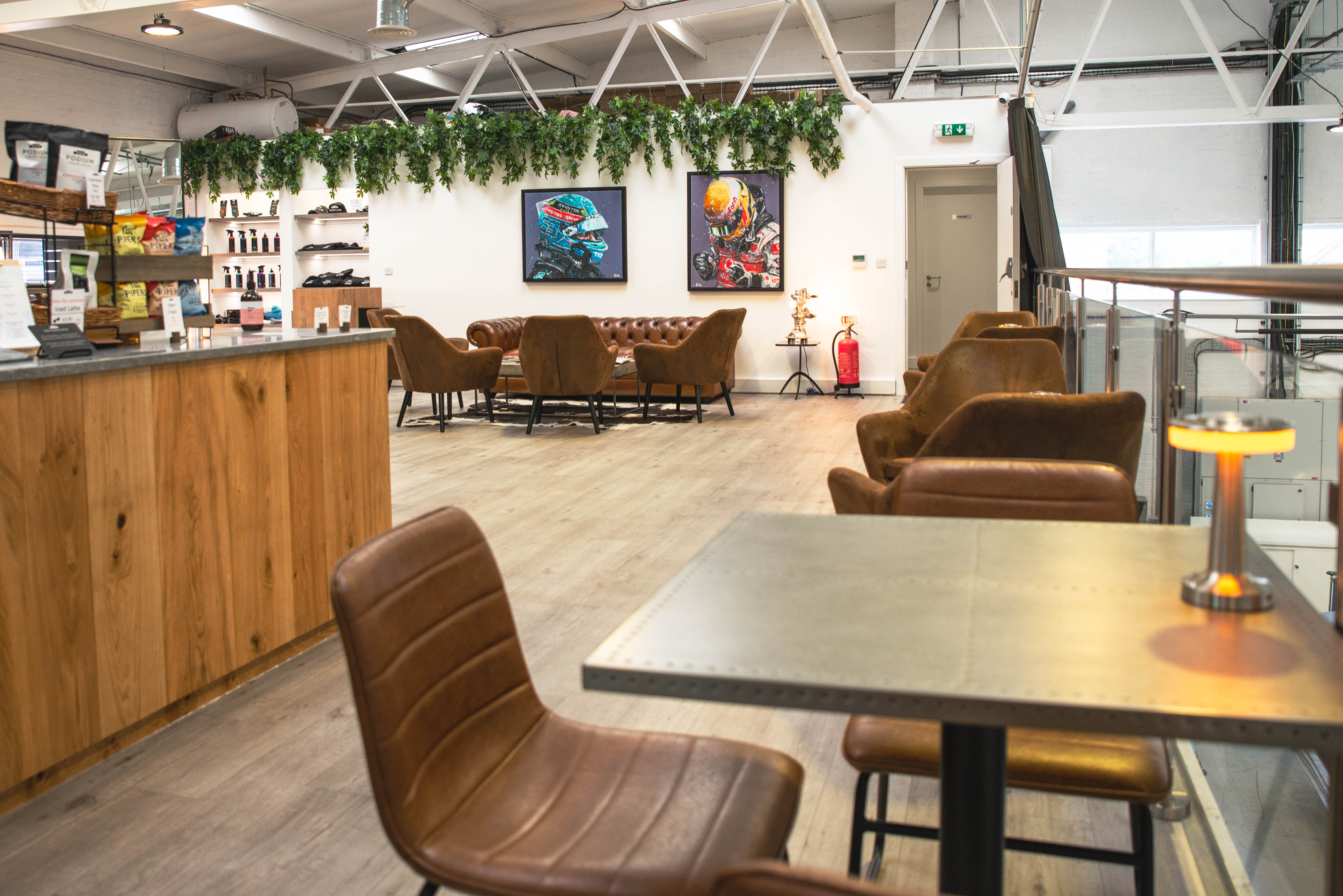 Modern meeting space with warm wood tones, ideal for networking events and gatherings.