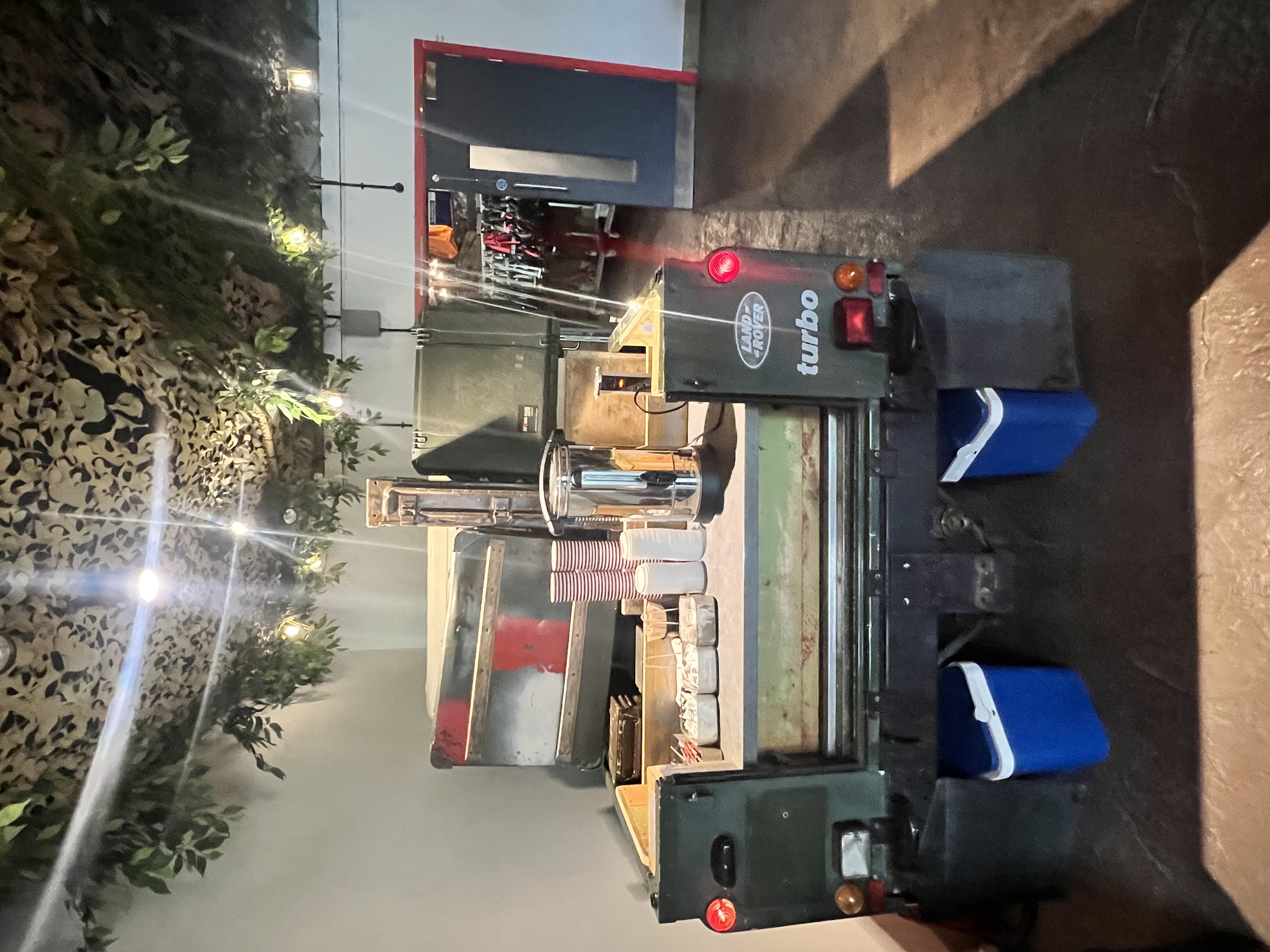 Military vehicle catering setup at Bear Grylls Adventure for outdoor events.