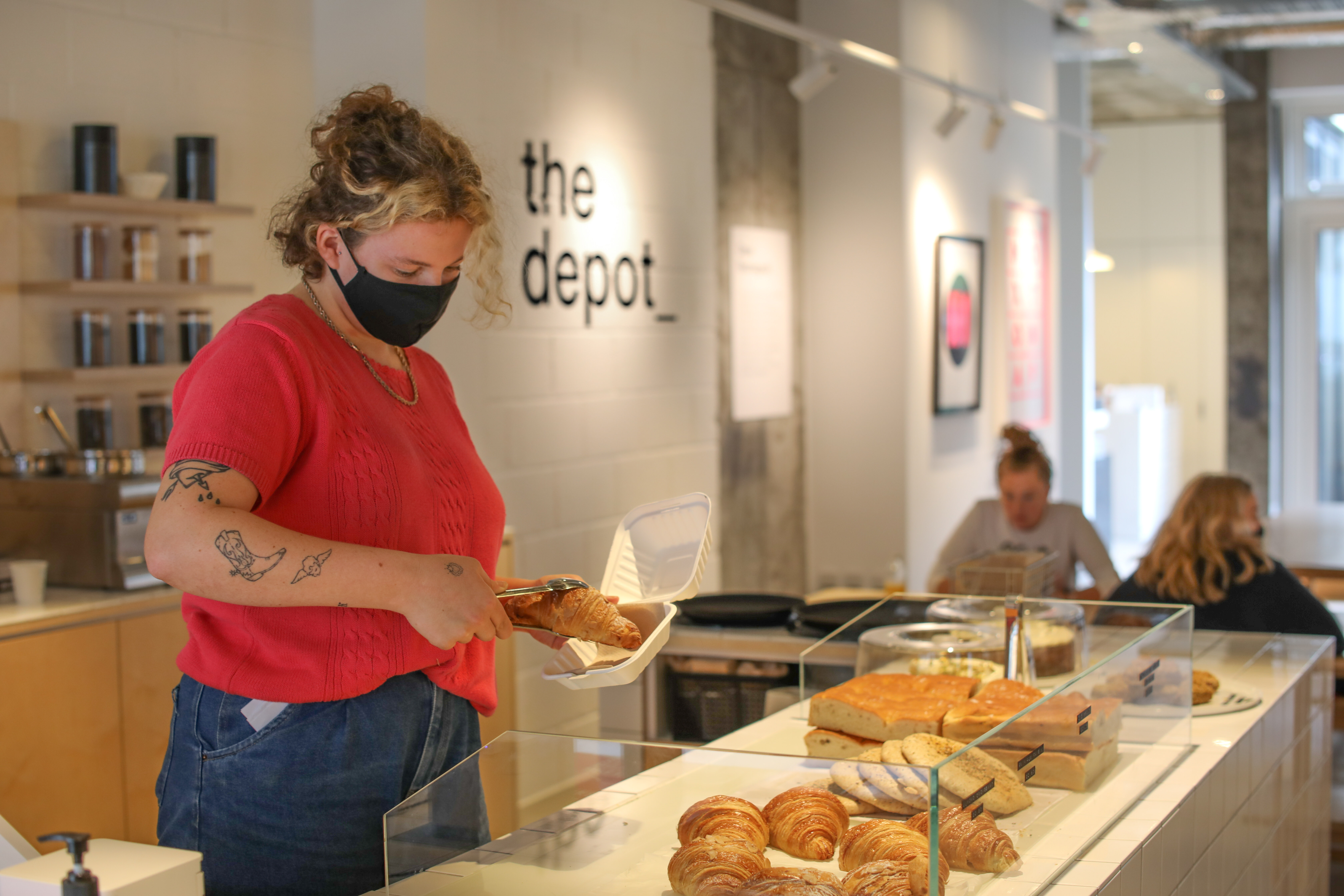 Vibrant café in event space with fresh pastries for meetings and networking.