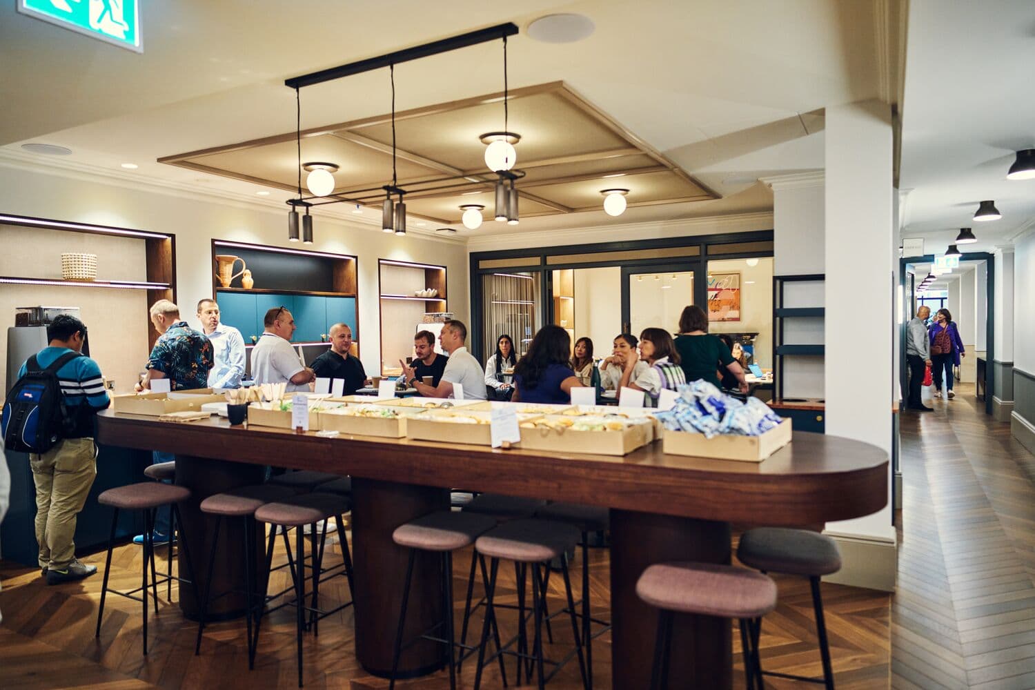 Vibrant networking space with modern bar at Salisbury House for events and meetings.