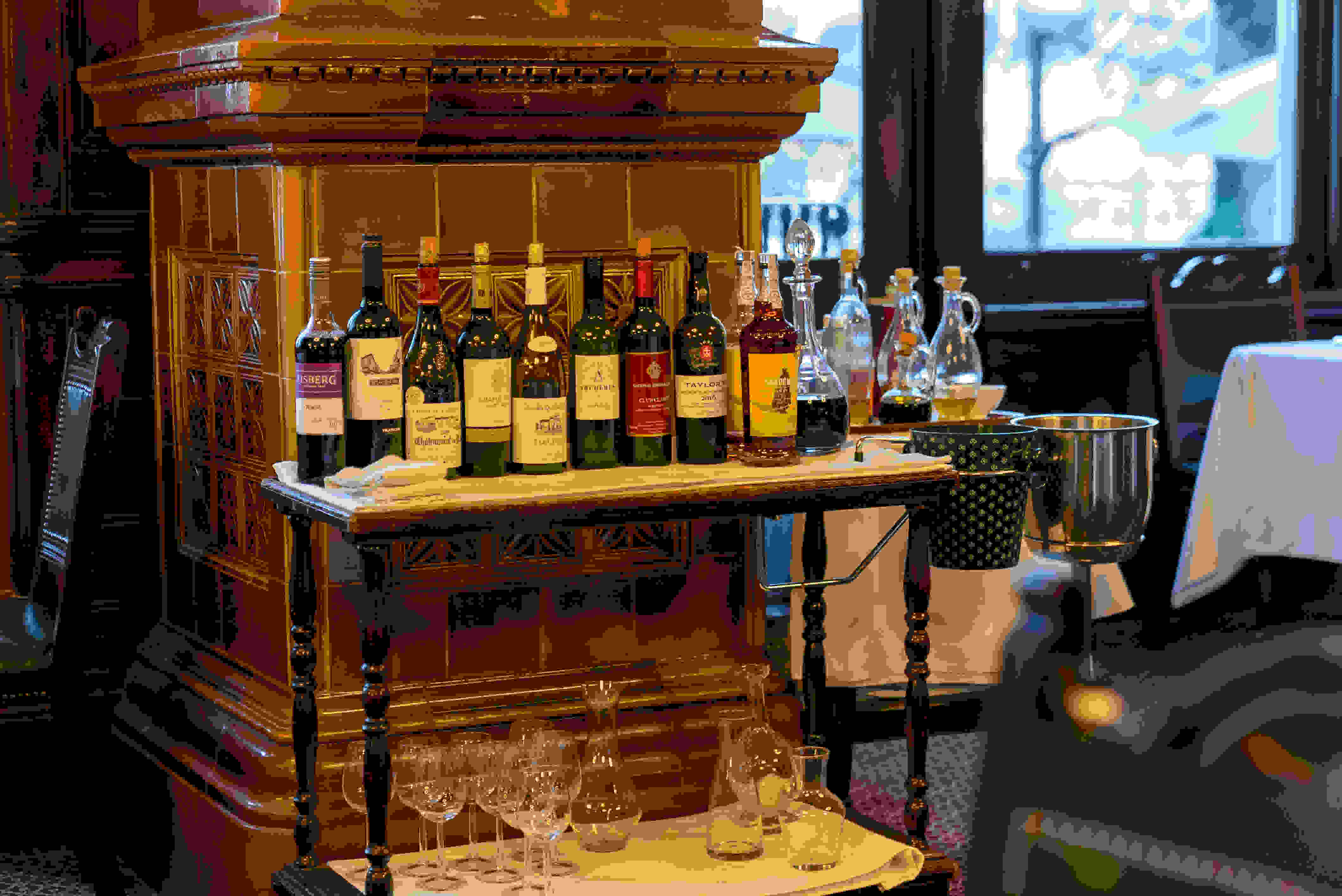 Elegant wine cart in Smoking Room, National Liberal Club for upscale networking events.