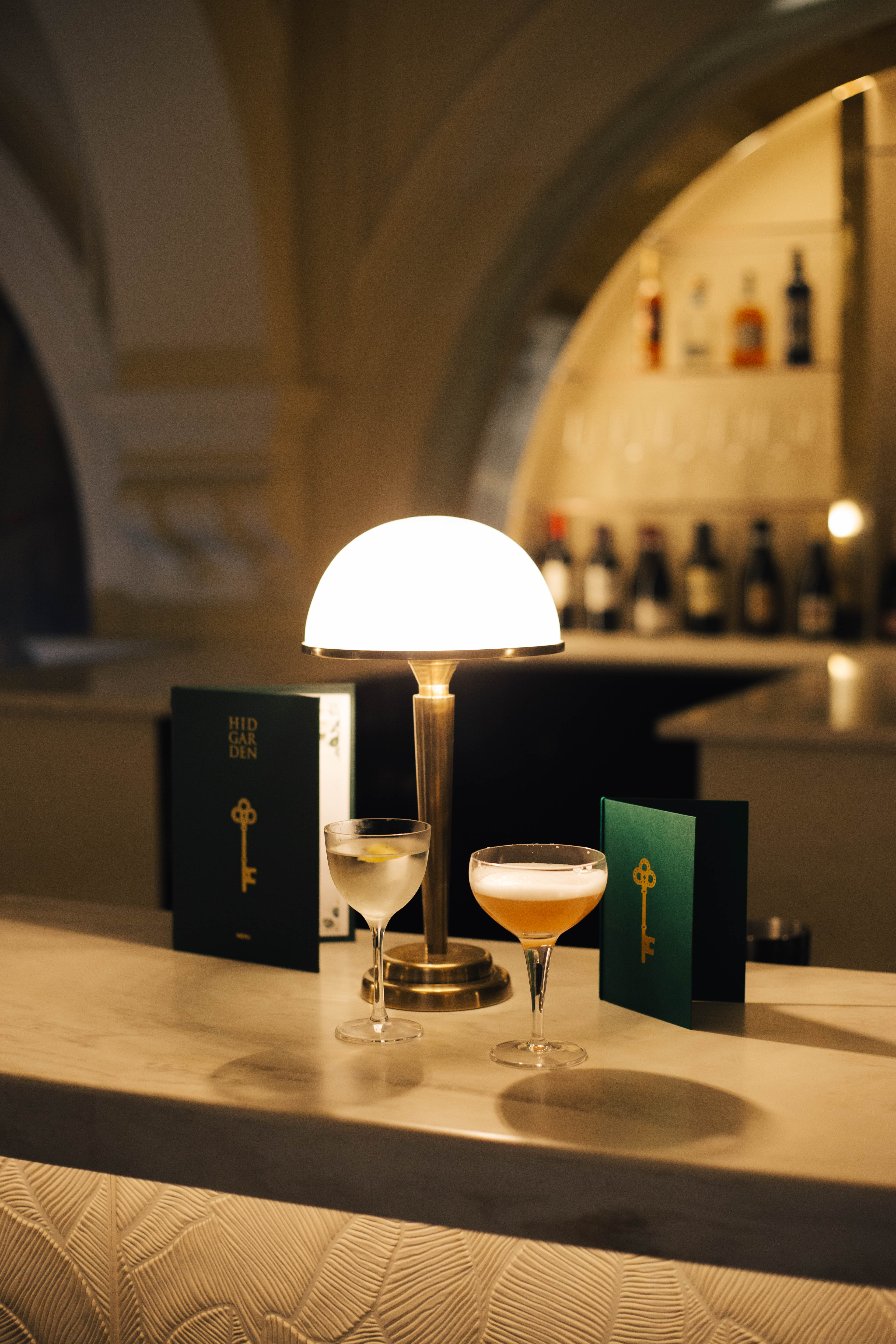 Stylish bar with elegant cocktails in The Hidden Garden for networking events.