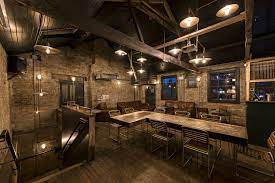 Rustic venue with exposed brick for intimate gatherings and corporate events in Queens Park.
