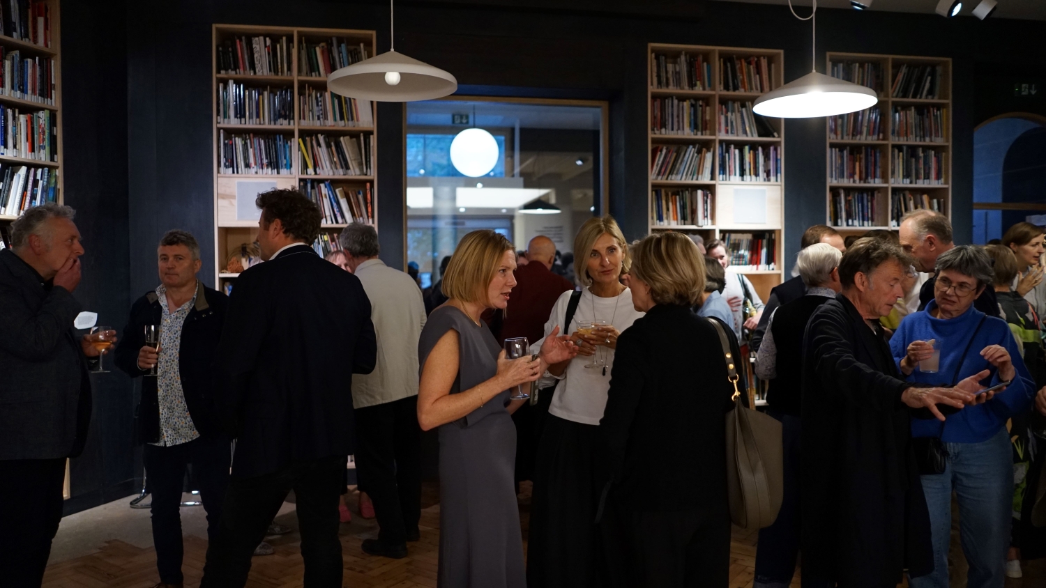 Vibrant networking event at Crafts Council Gallery with stylish ambiance and engaging conversations.