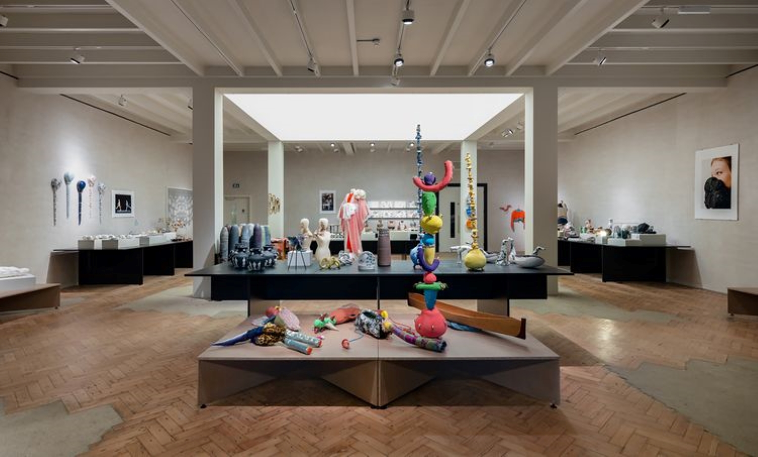 Contemporary art gallery with sculptures, ideal for corporate events and receptions.