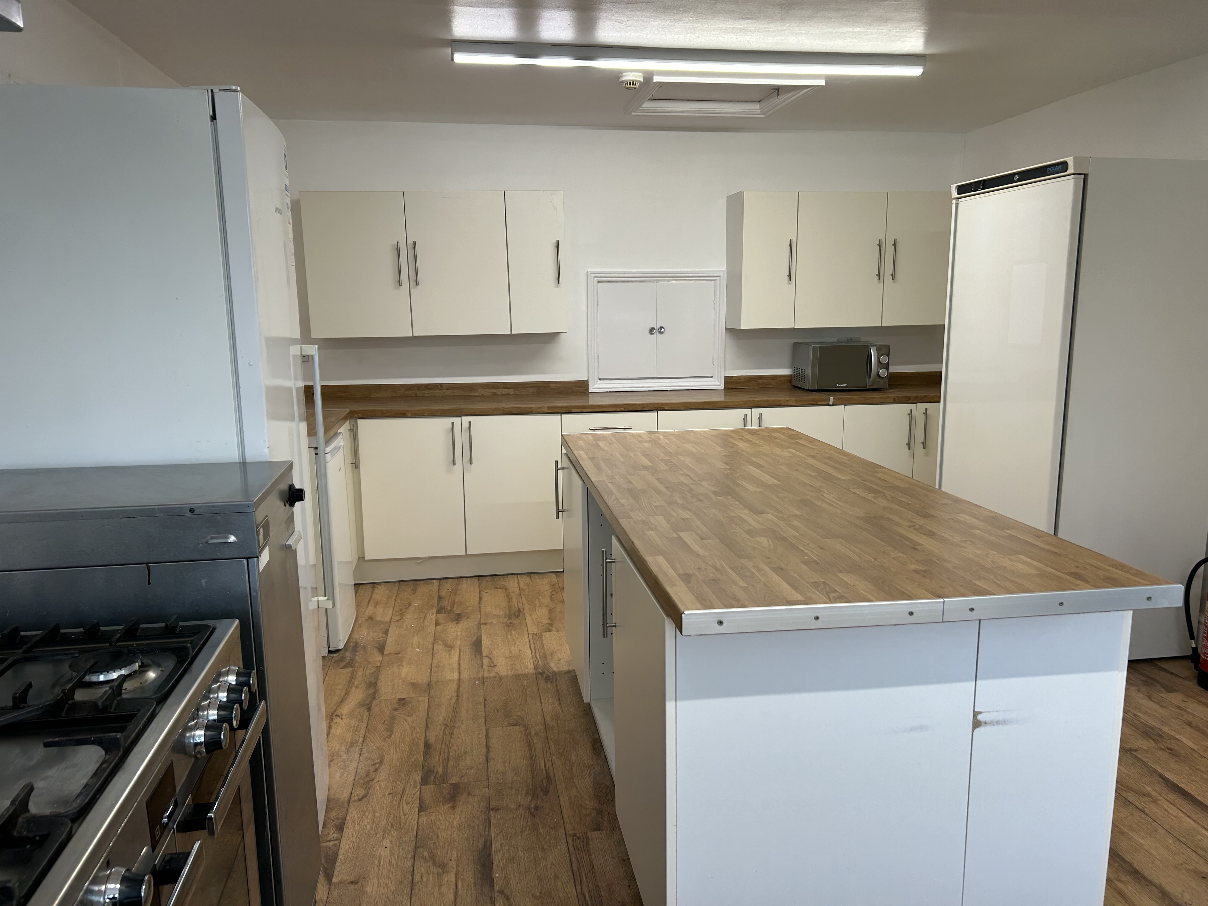 Modern kitchen in Linden and Cypress Event House, ideal for catering workshops and networking.