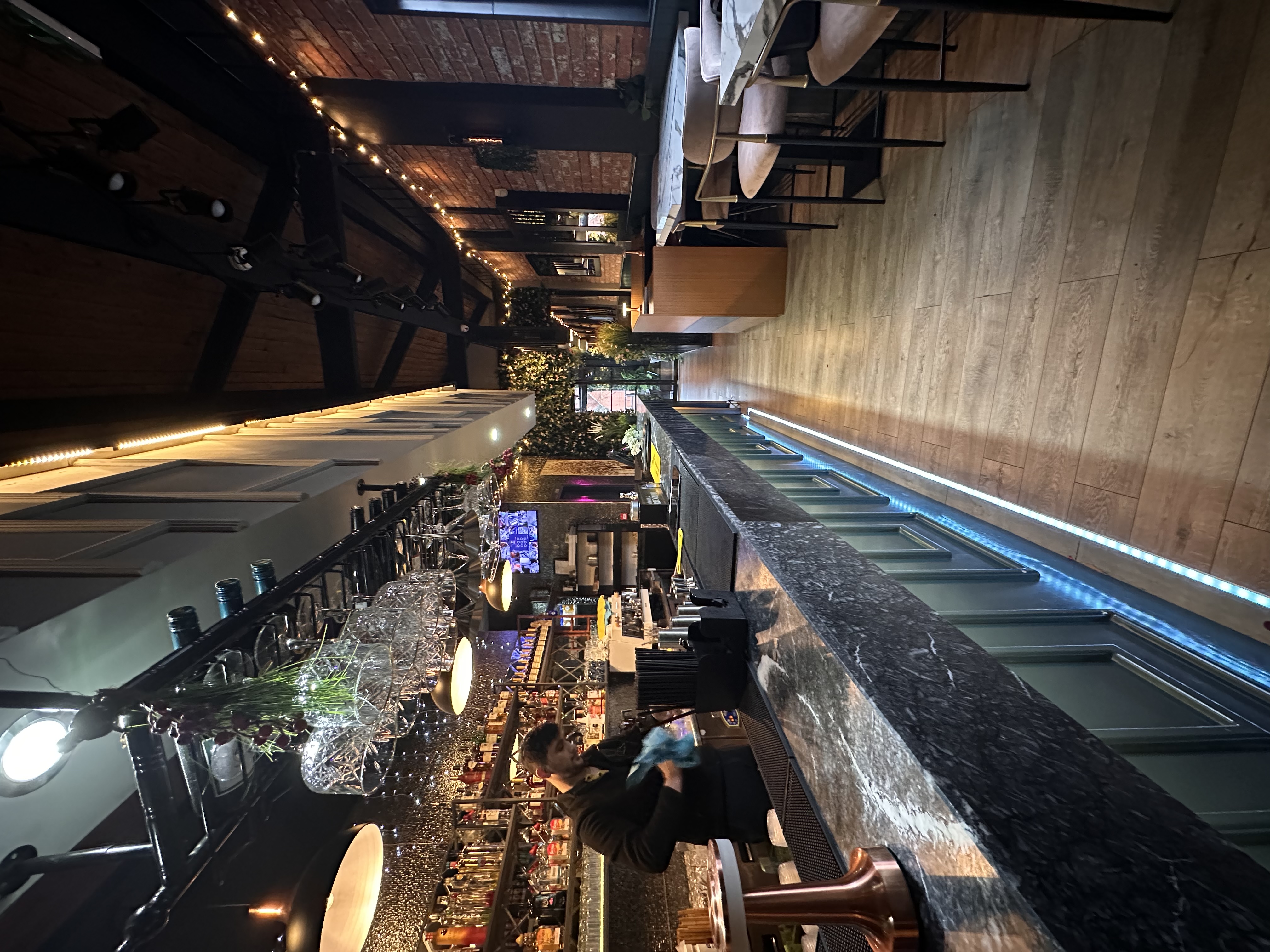 Stylish Ora Lounge bar with marble countertop, perfect for cocktail parties and networking events.