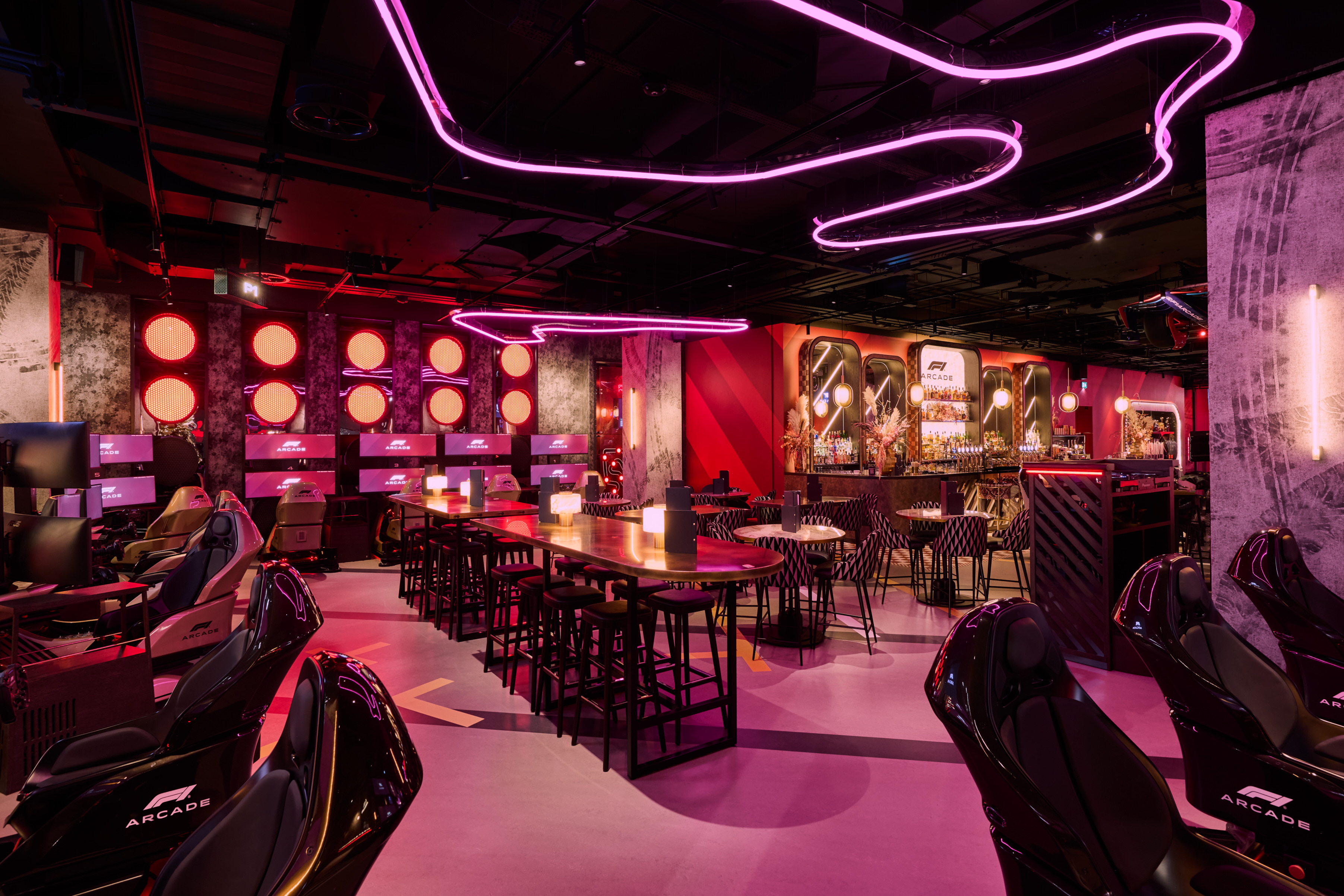 Vibrant P1 Semi-Private Space at F1 Arcade Birmingham for networking events and gatherings.