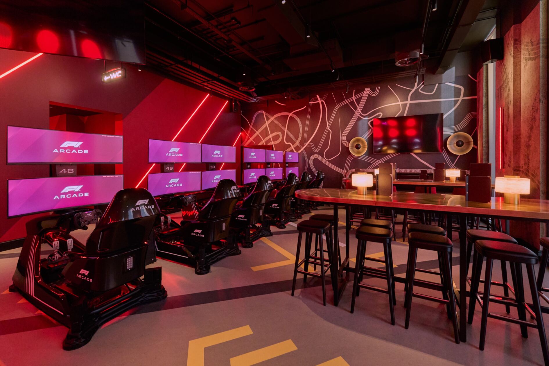 P5 Semi-Private Space at F1 Arcade Birmingham with racing simulators for corporate events.