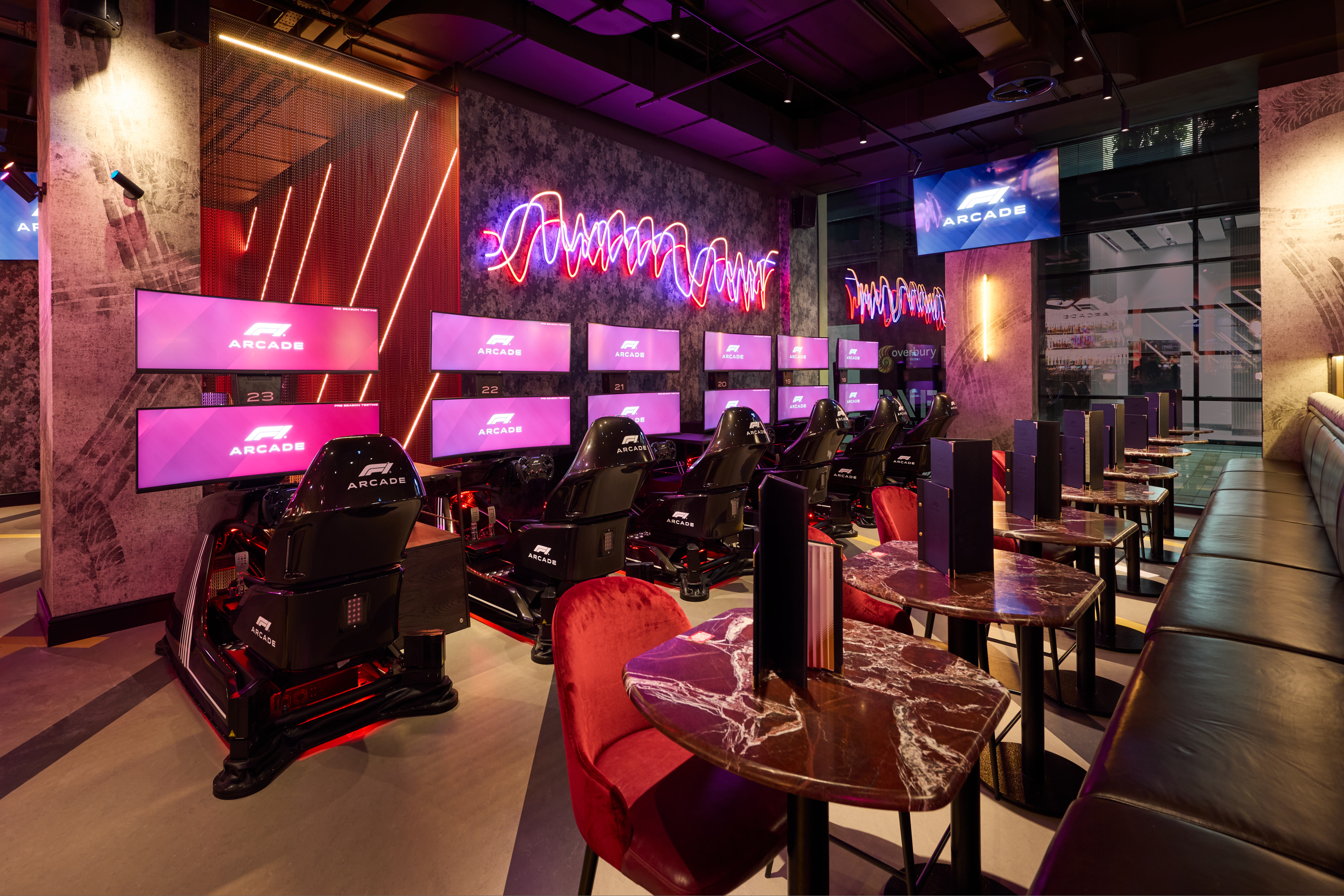 Full Venue Hire at F1 Arcade Birmingham with sleek racing simulators for corporate events.