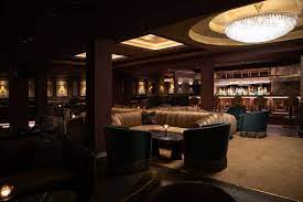 Sophisticated lounge with plush seating for upscale gatherings and networking events.