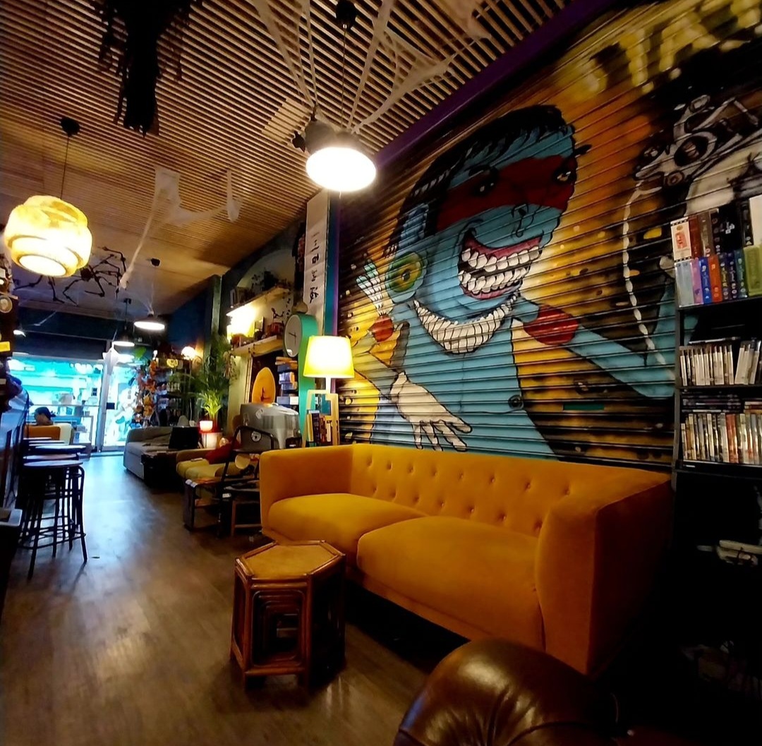 Vibrant Zombie Games Cafe with bold mural, ideal for networking and brainstorming events.