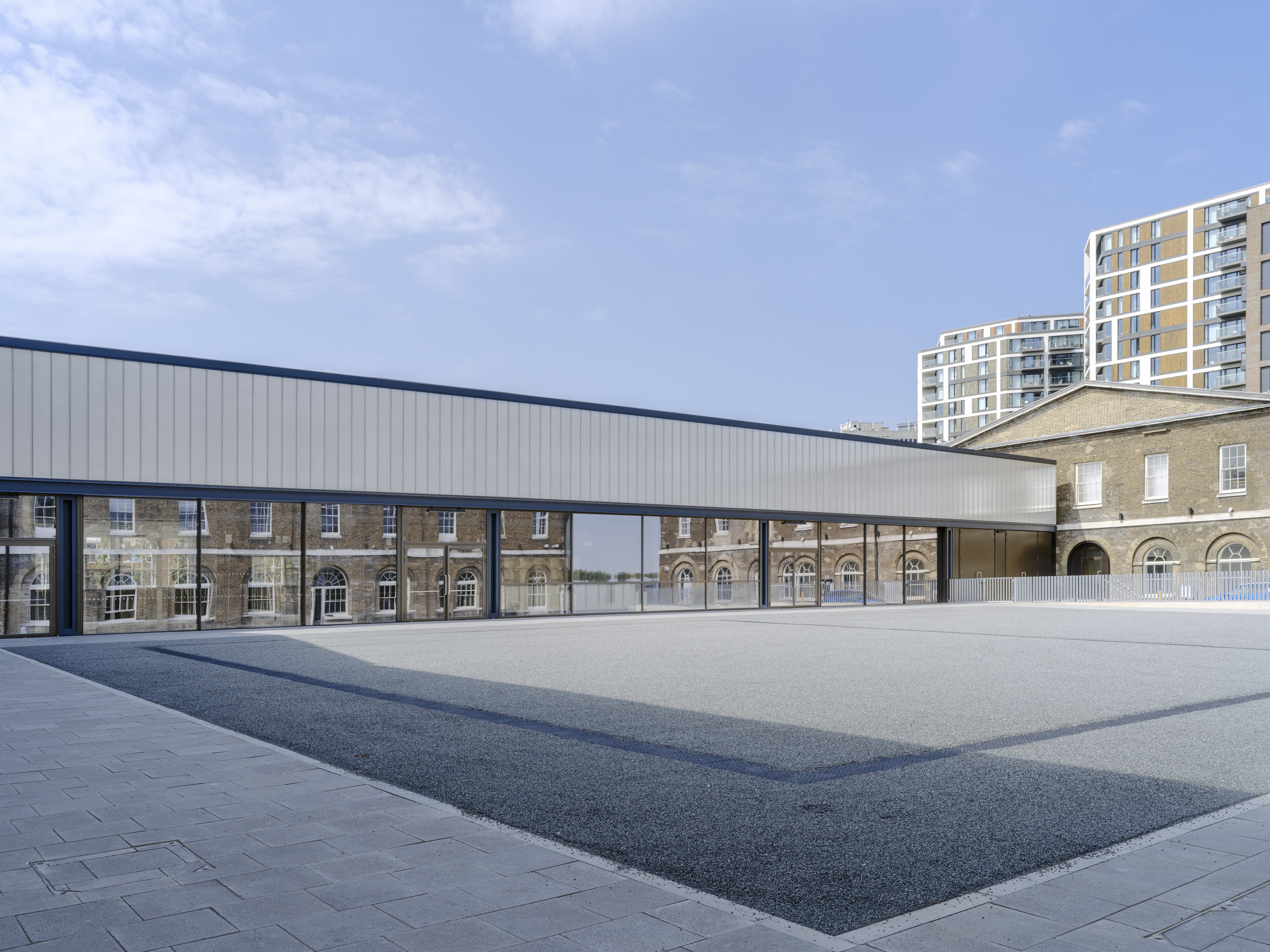 Modern event space in Woolwich with glass facade, ideal for corporate and social gatherings.