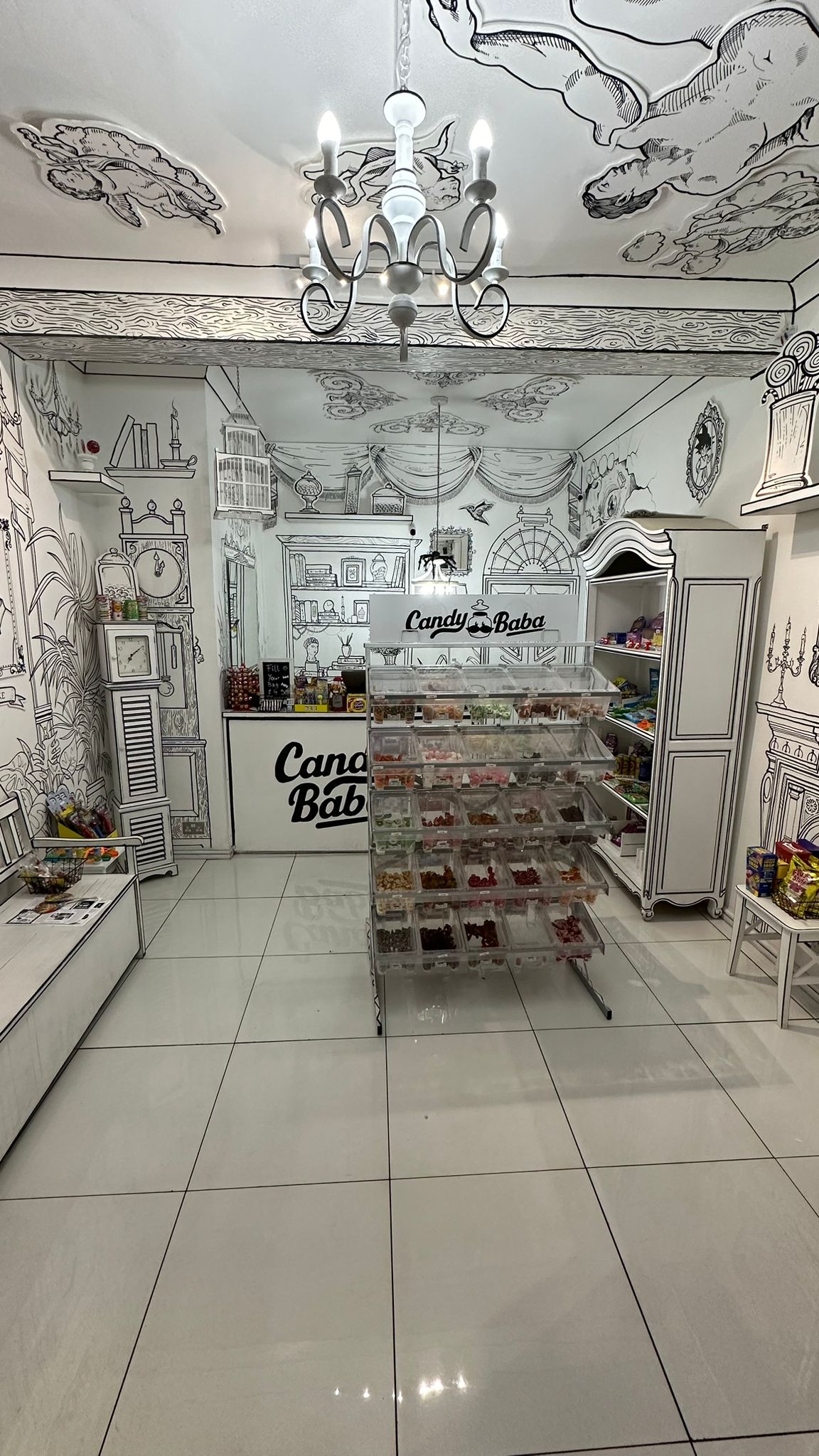 Whimsical candy shop with colorful displays, ideal for birthday parties and events.