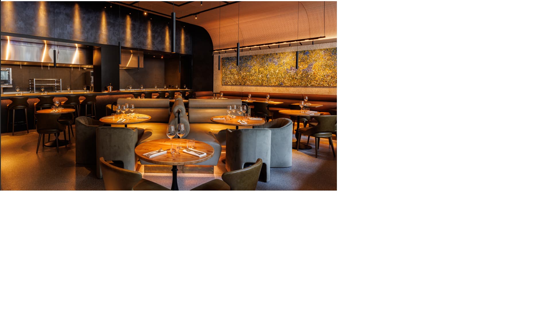 Sophisticated dining space with warm lighting for intimate gatherings and corporate events.