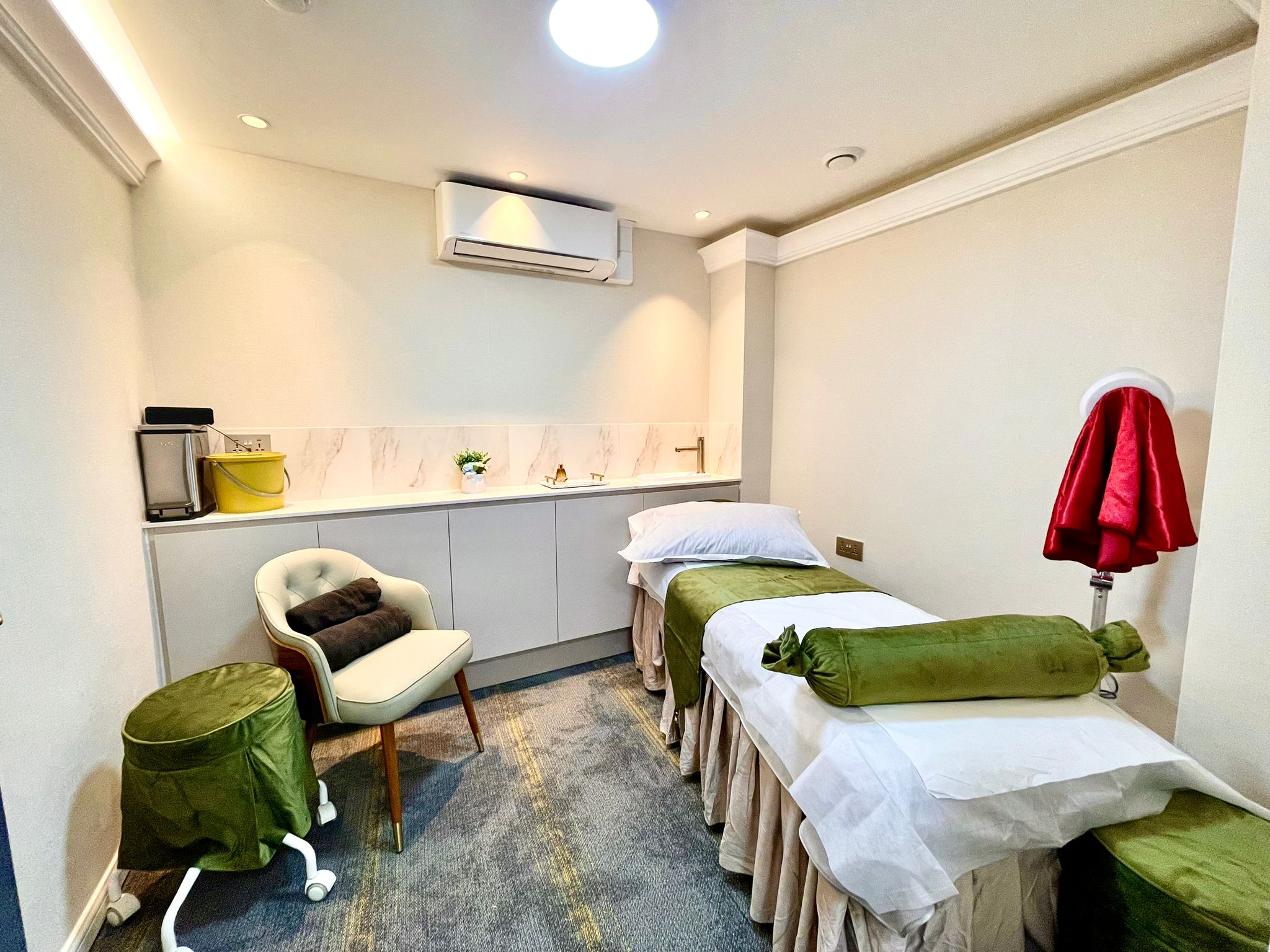 Serene therapy room with massage table for wellness events and relaxation sessions.