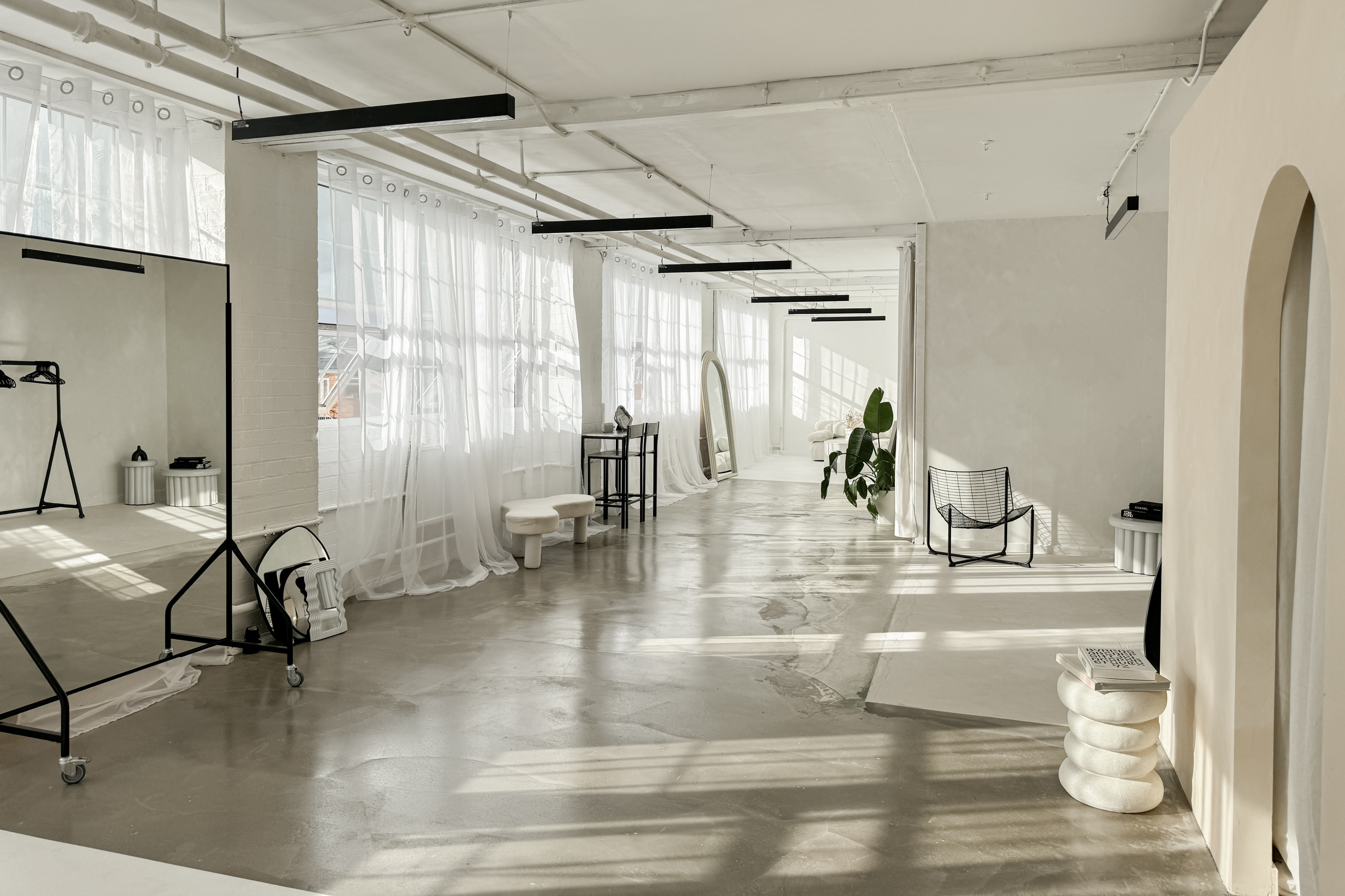 Bright, spacious Content Studio with large windows for meetings and events.