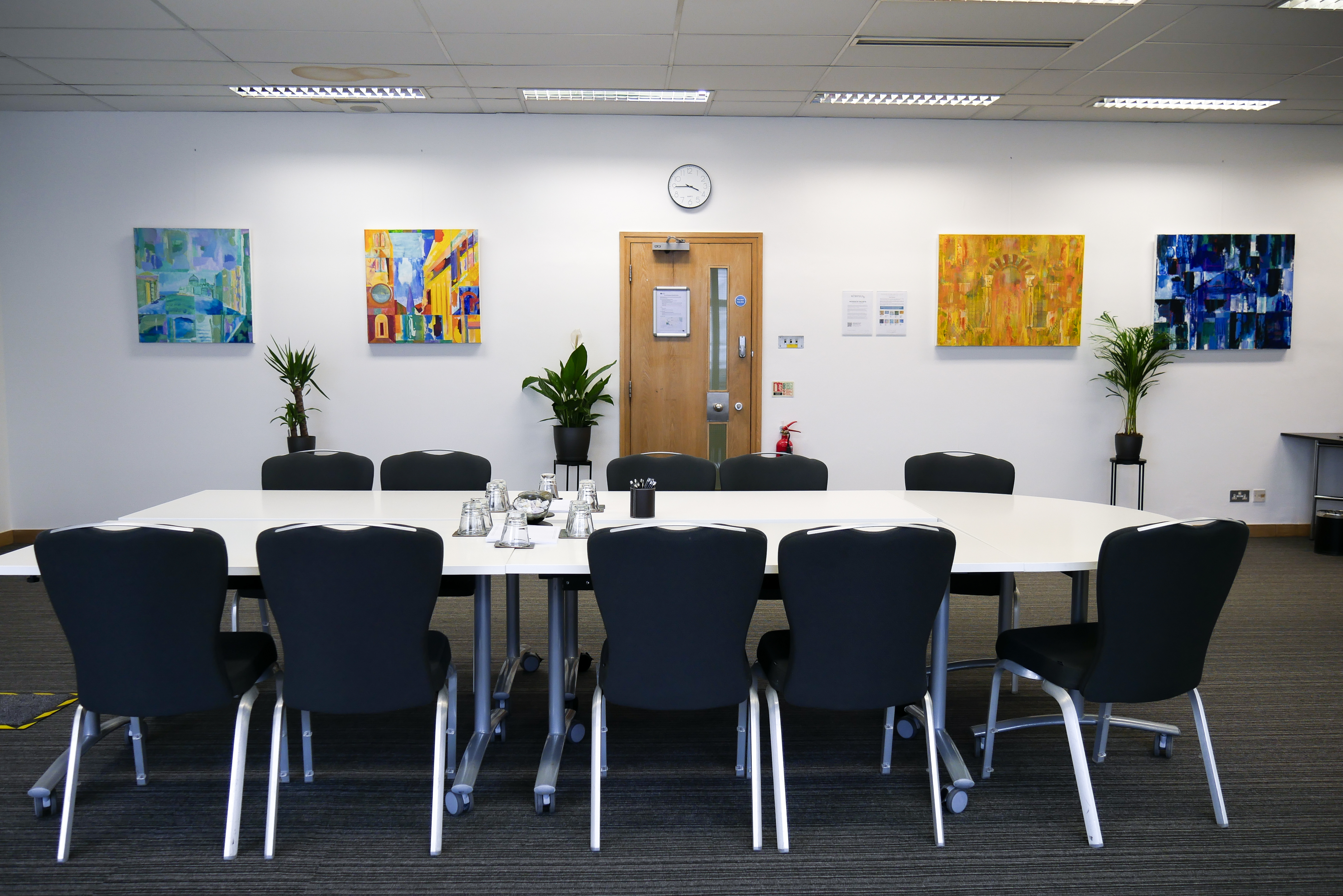 4th Floor Meeting Room at 1 Wimpole Street with oval table, ideal for events and presentations.