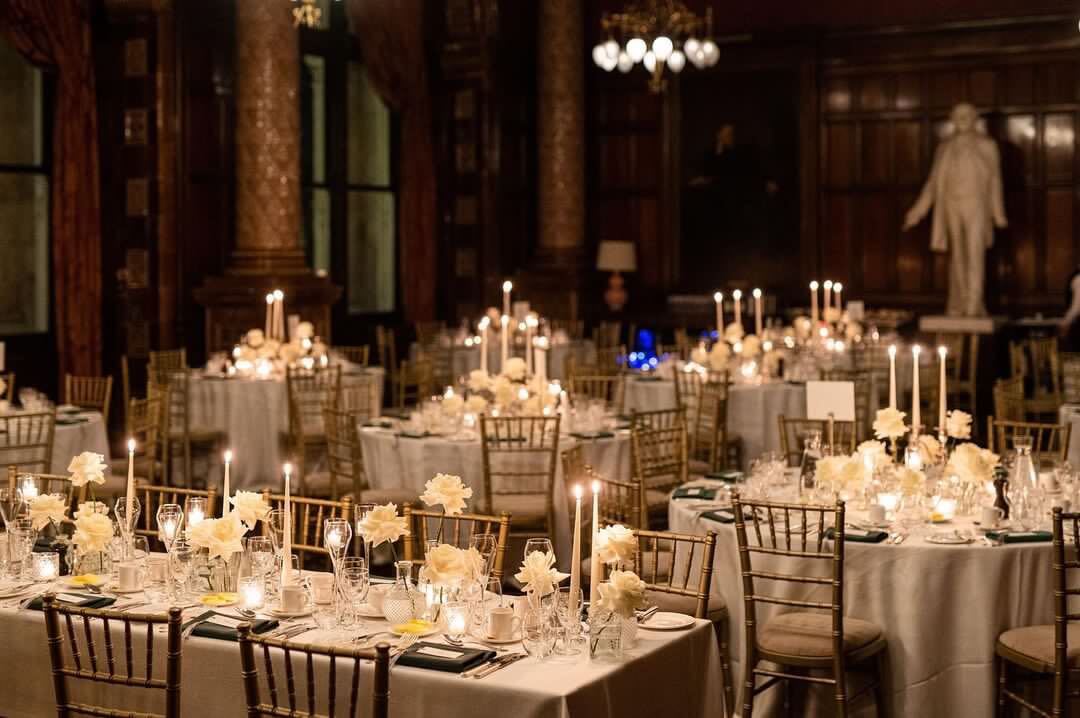 Elegant banquet hall with floral centerpieces for weddings and formal events.