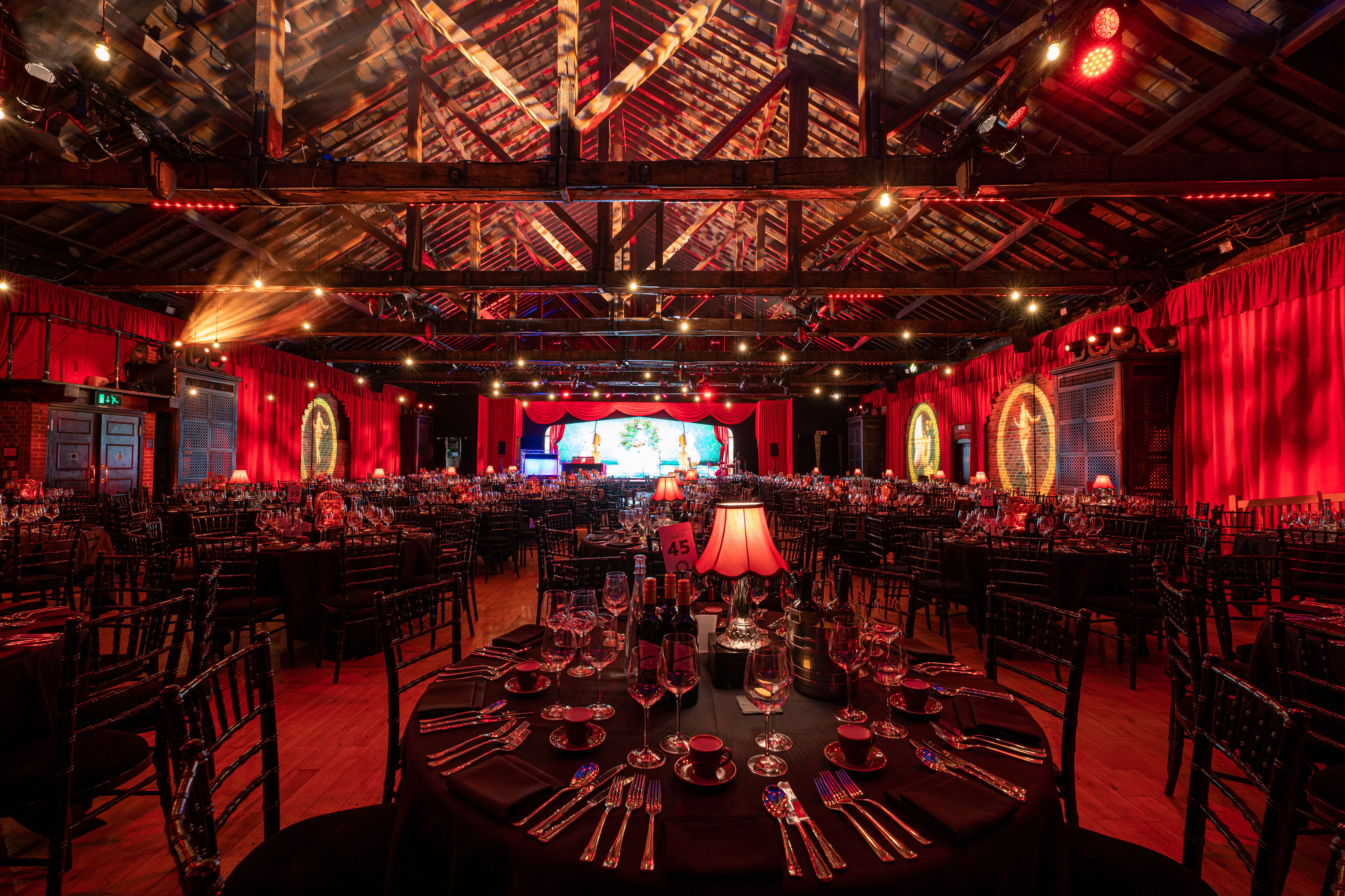 Elegant round tables set for Christmas parties at The Brewery, perfect for gala dinners.