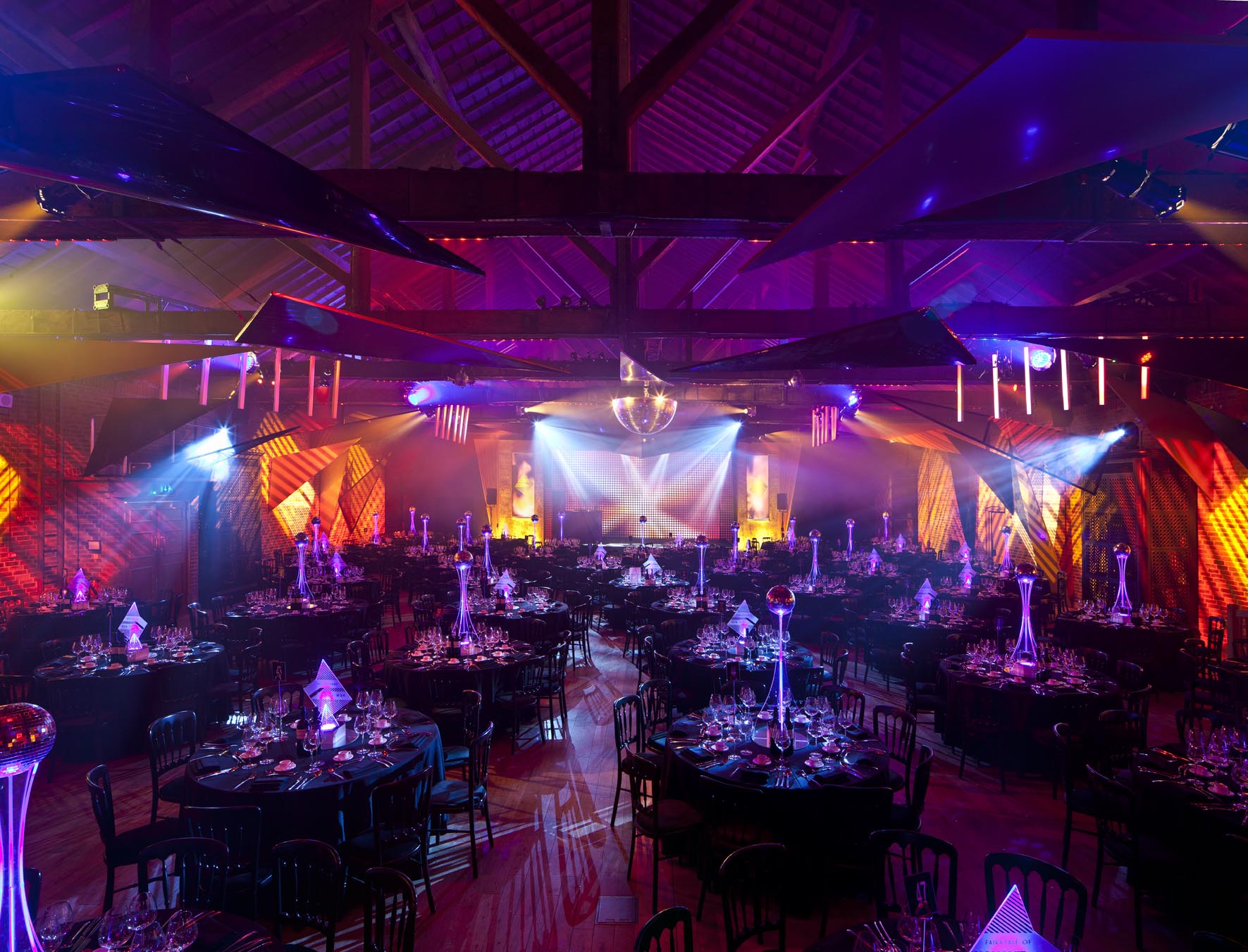 Elegant Christmas party setup with black linens at The Brewery, perfect for corporate events.
