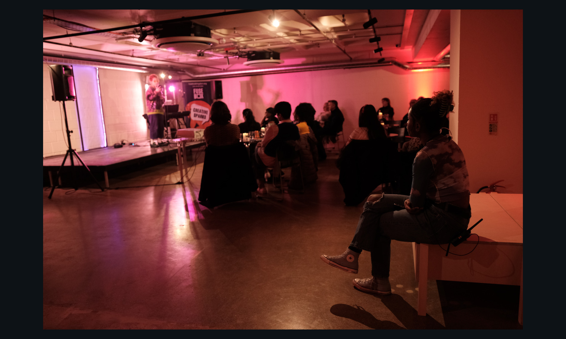 FUSEBOX Kingston event space with stage, ideal for networking and educational gatherings.