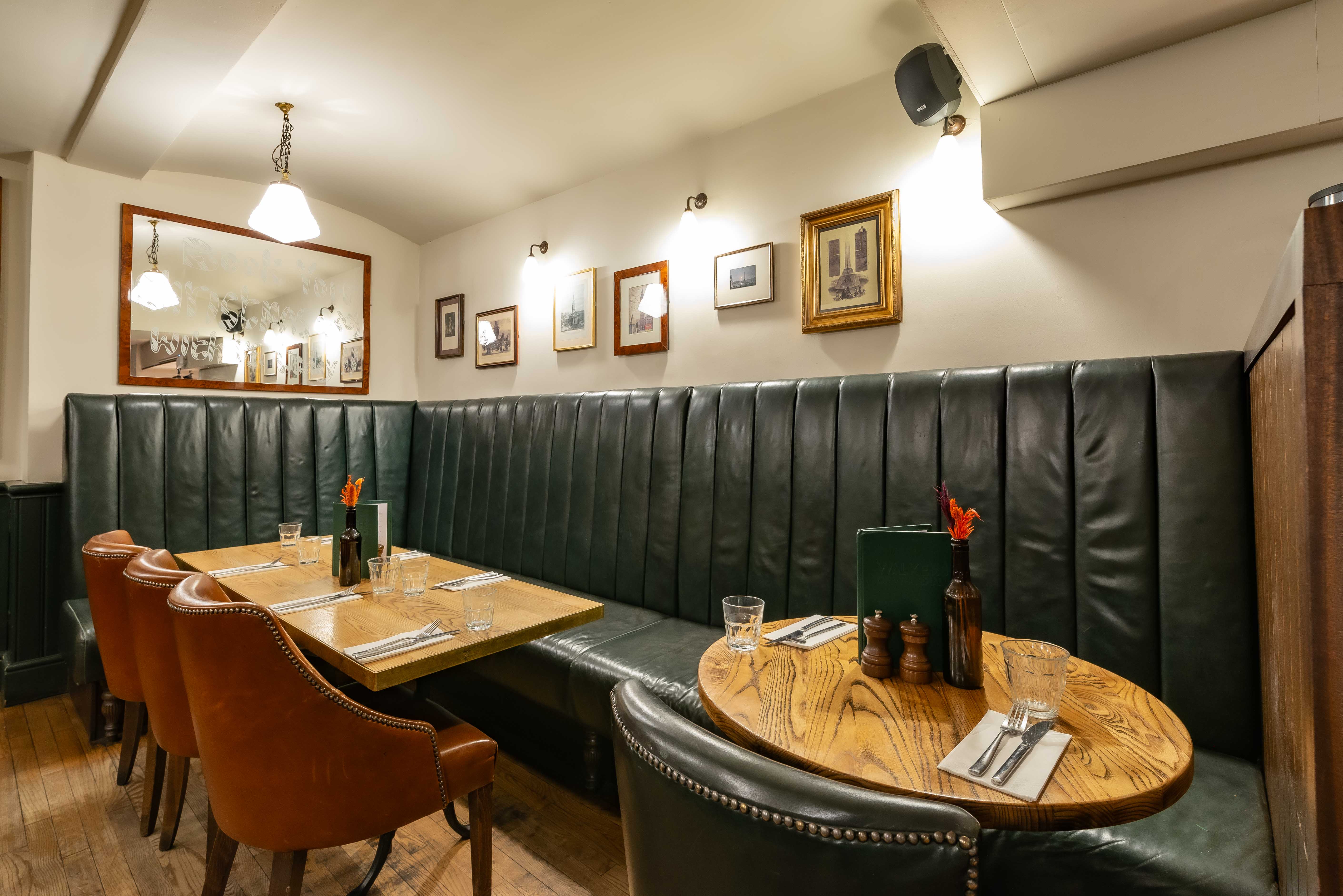 Cozy dining room with plush seating for intimate meetings and small events.