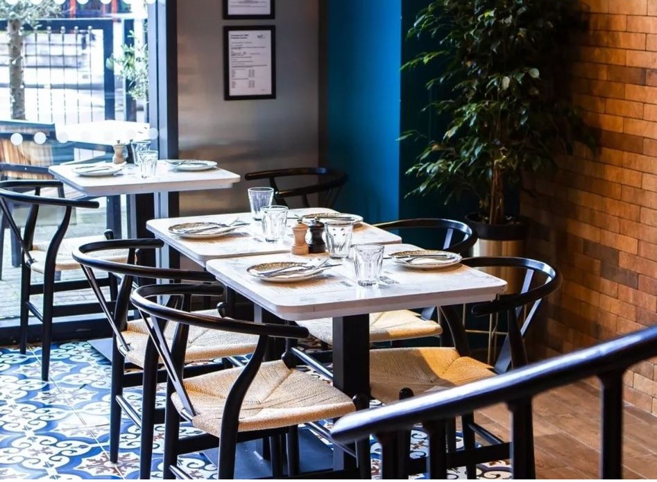 Intimate dining space at Salt & Plum Restaurant, perfect for networking events.