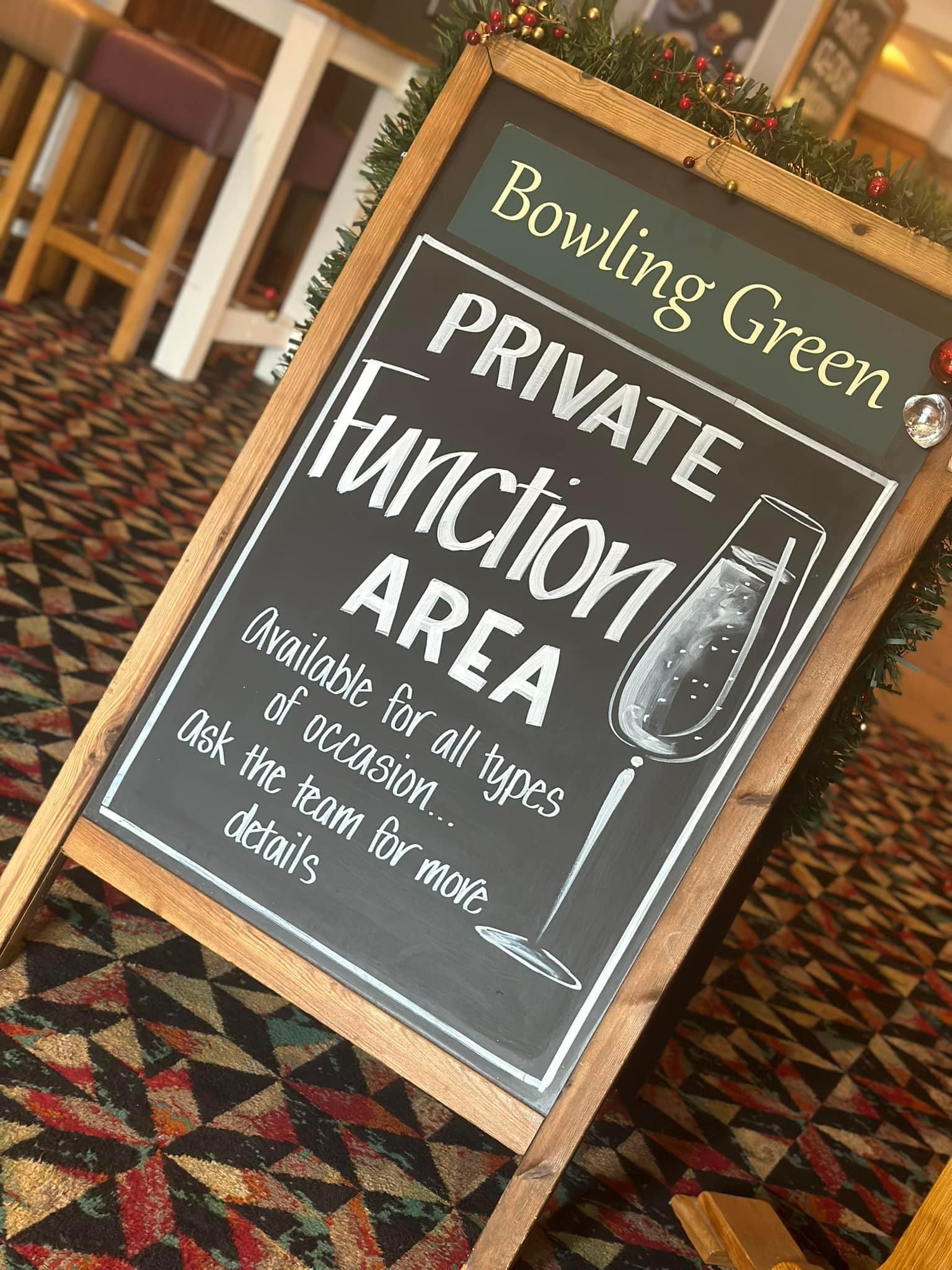 Welcoming sign for private events at The Bowling Green with chalkboard design.